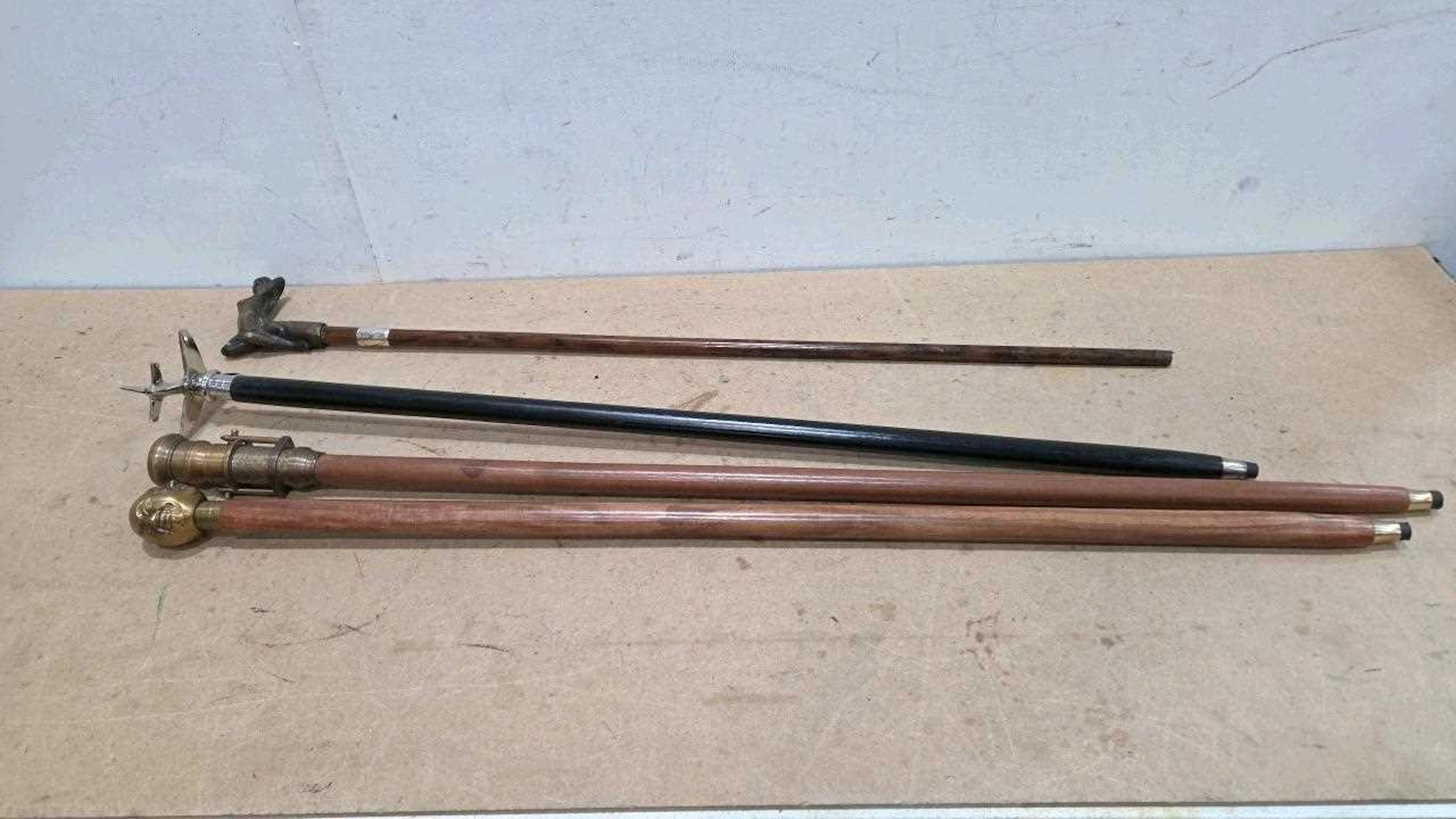 COLLECTION OF 4 WALKING STICKS