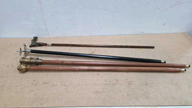 COLLECTION OF 4 WALKING STICKS