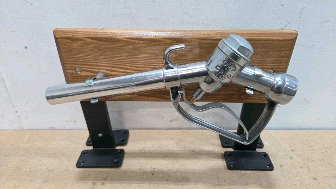 PETROL PUMP NOZZLE ON DISPLAY STAND