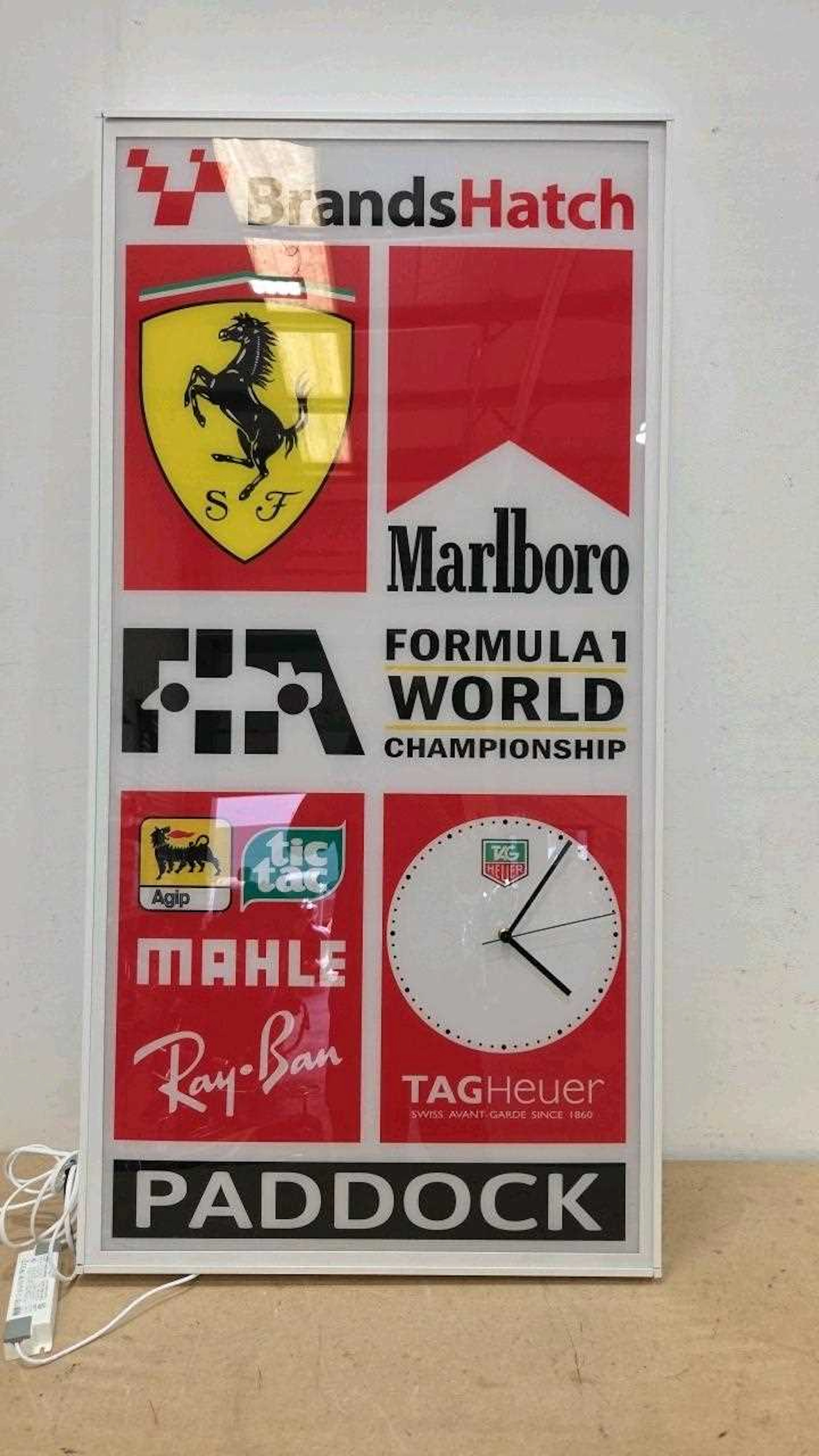 ILLUMINATED BRANDS HATCH FORMULA 1 FERRARI PADDOCK CLOCK 48" X 24"