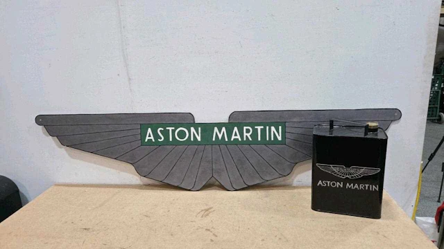 WOODEN ASTON MARTIN SIGN AND REPRO PETROL CAN