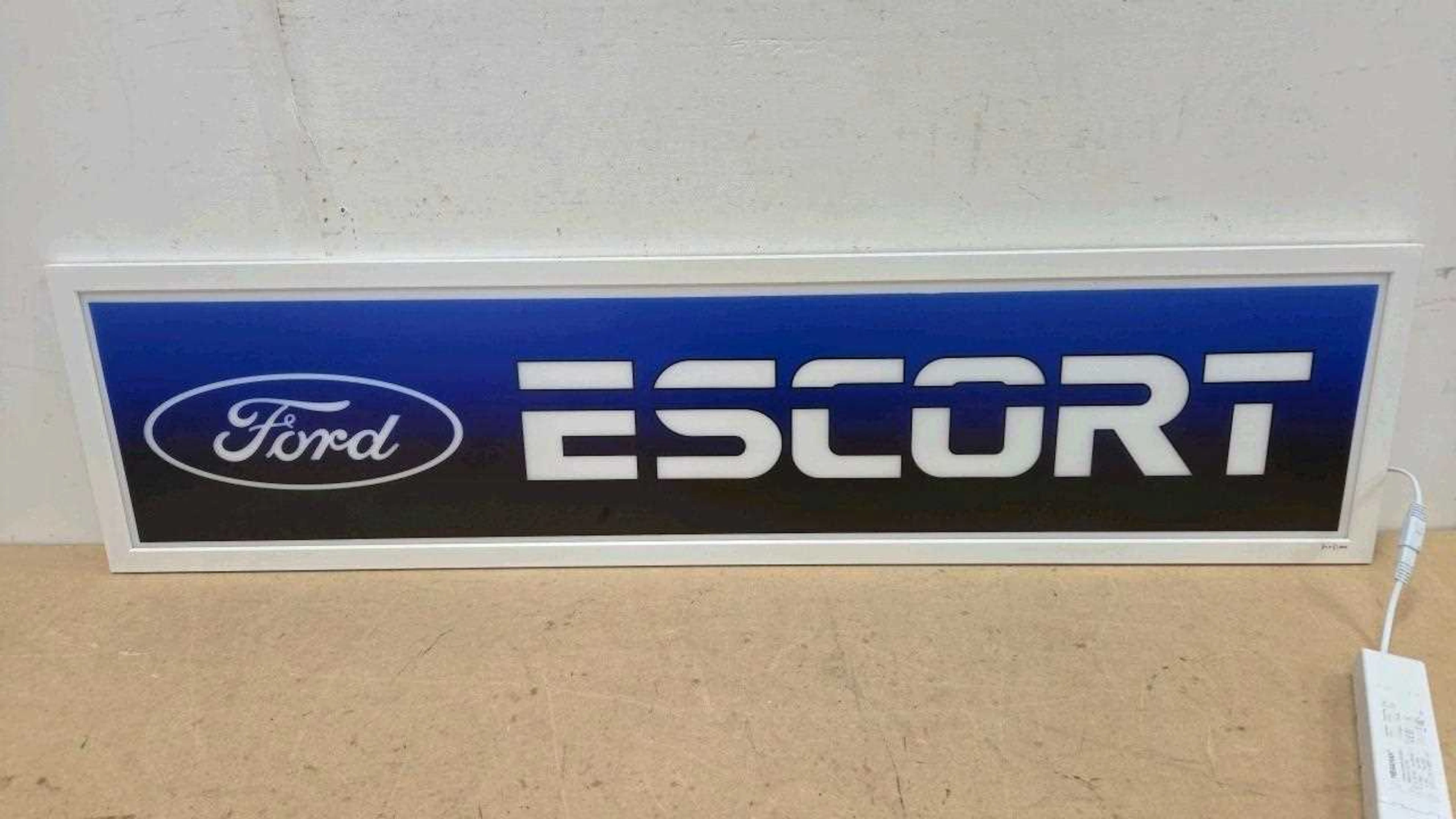 FORD ESCORT ILLUMINATED SIGN 47" X 12"