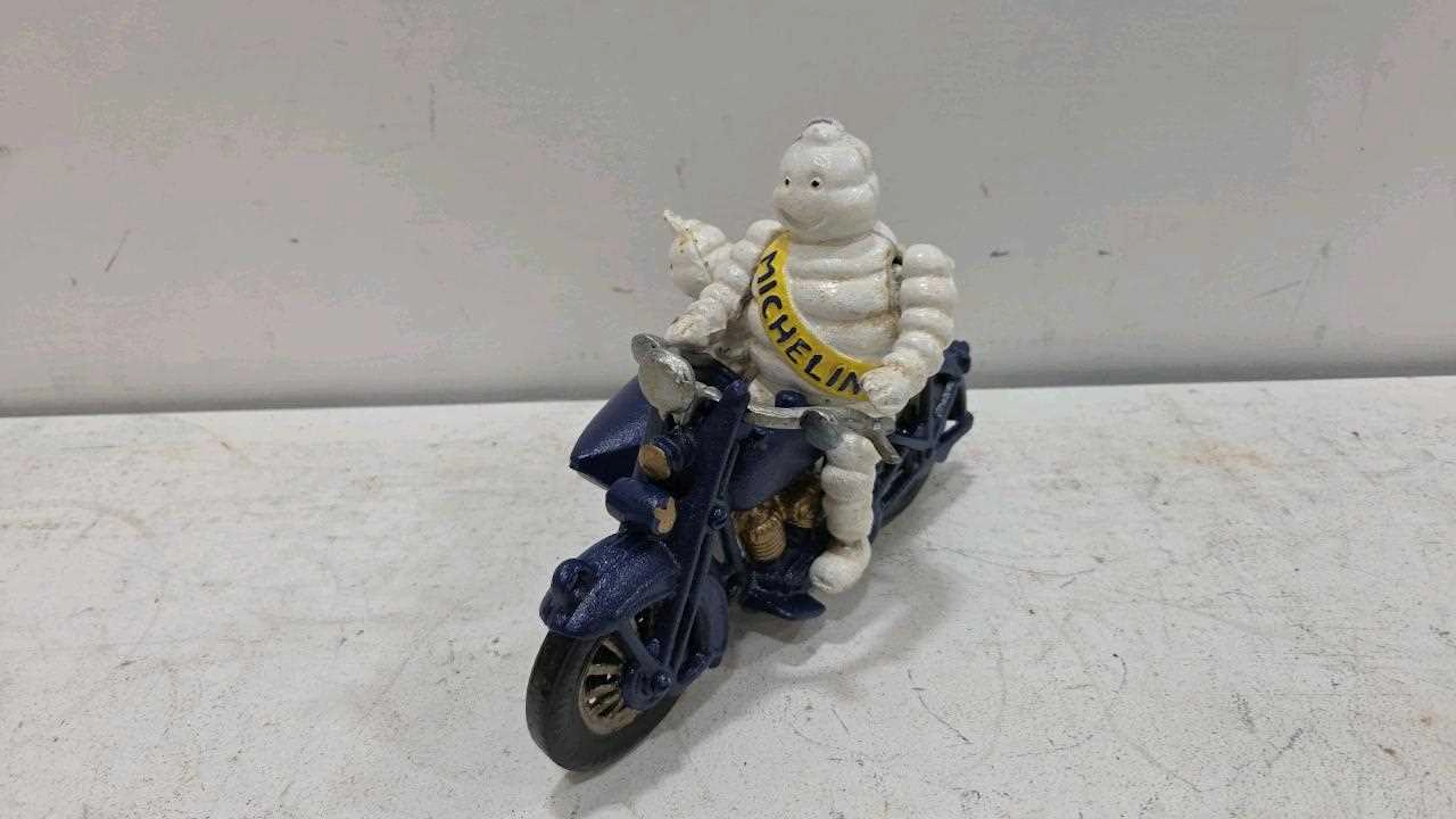 CAST MICHELIN MAN ON MOTOR BIKE AND SIDECAR 9" X 6"