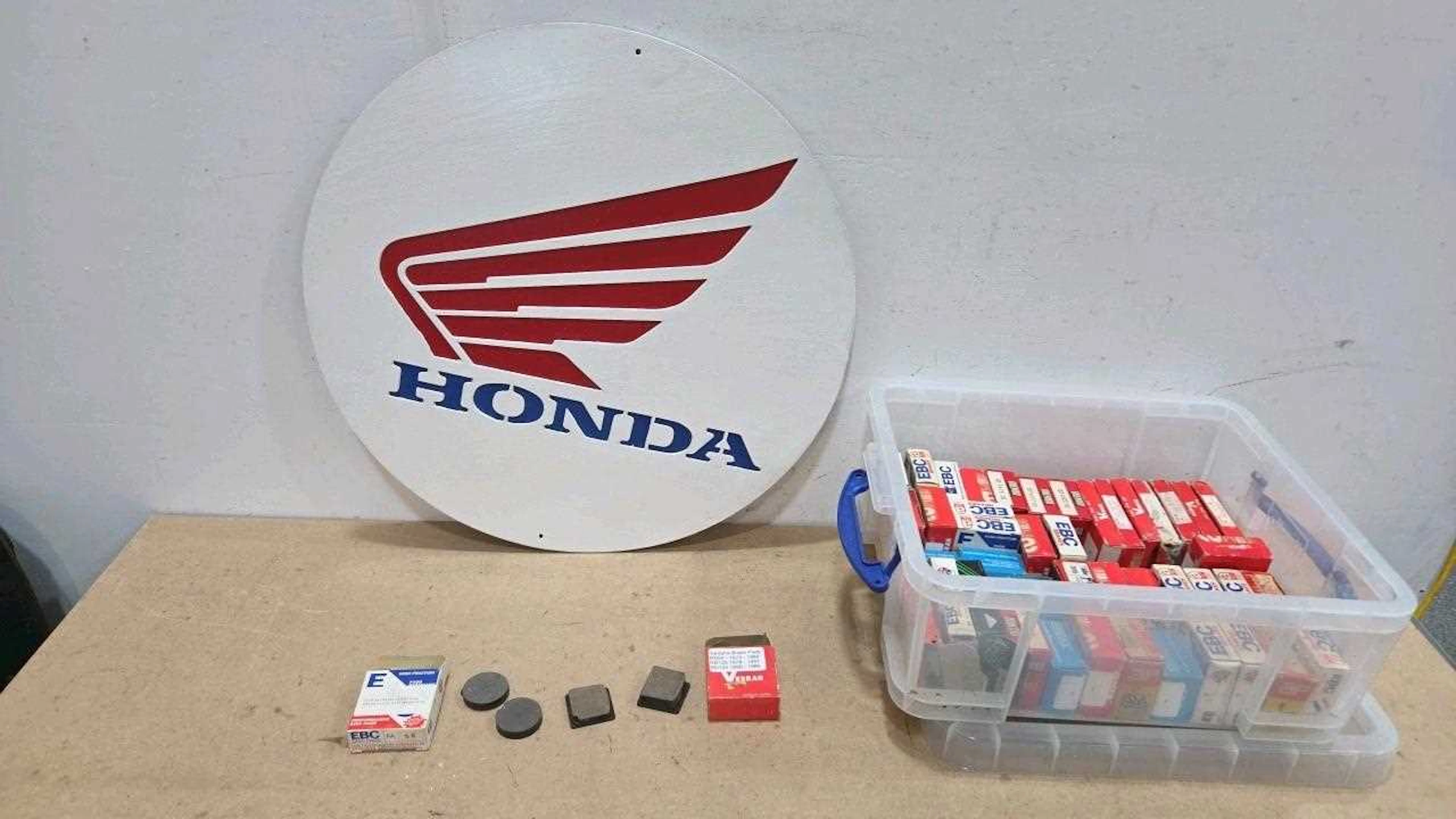 WOODEN HONDA SIGN & BOX OF NOS M/CYCLE BRAKE PADS