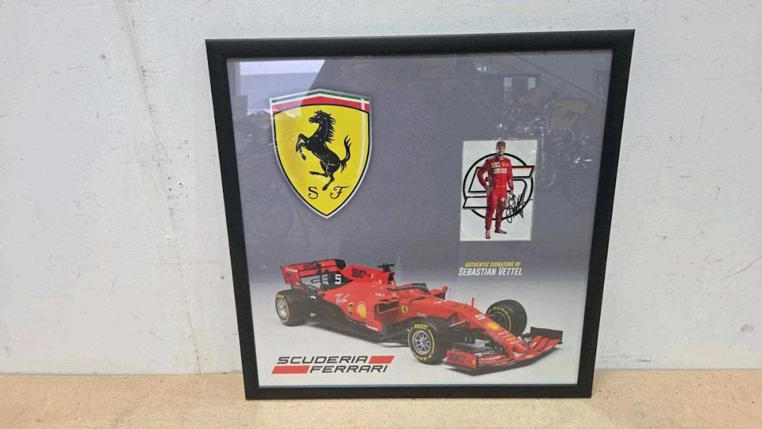 SIGNED FRAMED SEBASTIAN VETTEL SIGNED PHOTO, WITH CERTIFICATE OF AUTHENTICATION