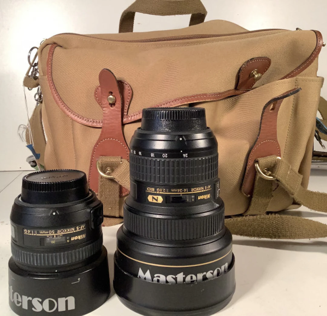 55 - Nikon objektiivit ja kameralaukku