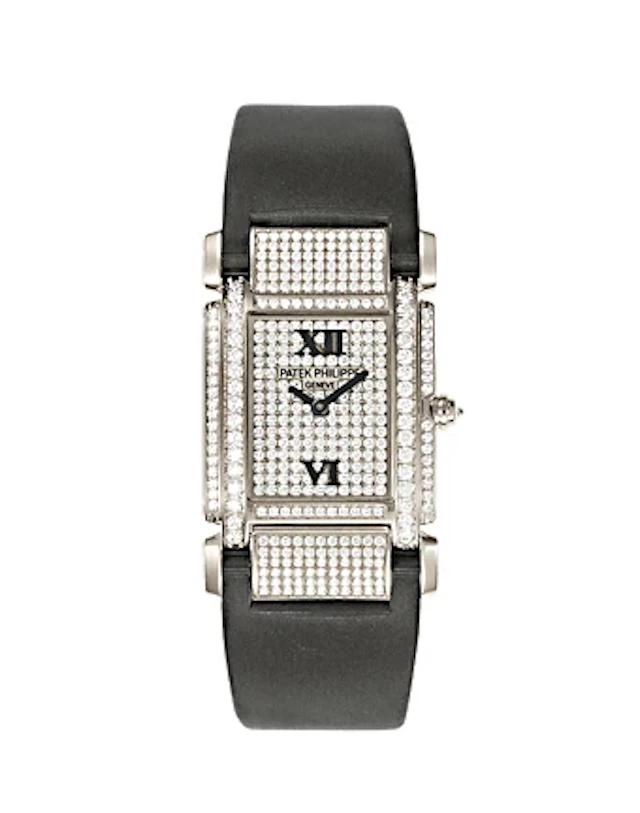 Patek Philippe Twenty~4 18K White Gold & Baguette Diamond Lady’s Watch
