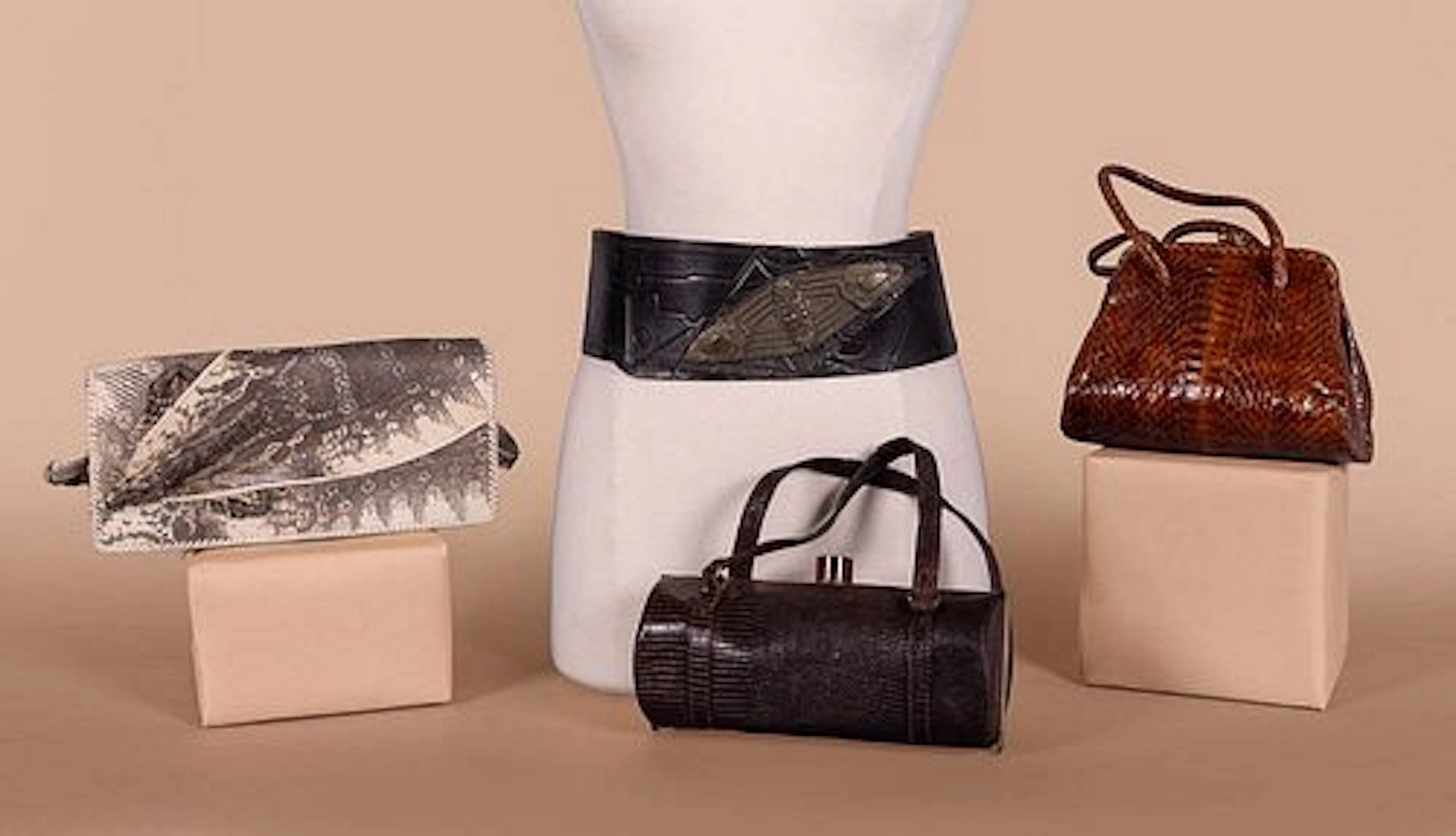 THREE REPTILE PURSES & ONE MODERNIST TOOLED BELT, MID 20TH C