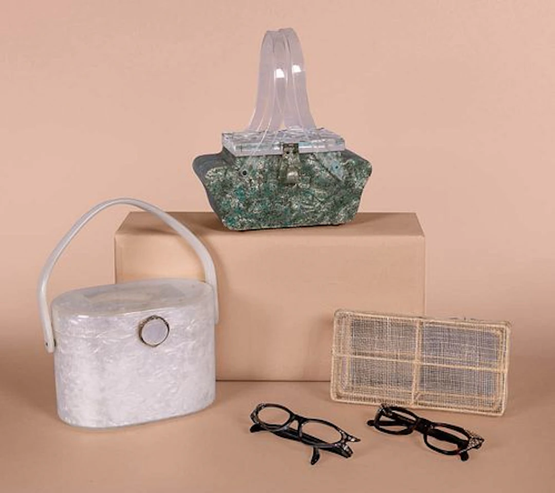 TWO LUCITE HANDBAGS & TWO PAIRS CATEYE GLASSES, 1950S