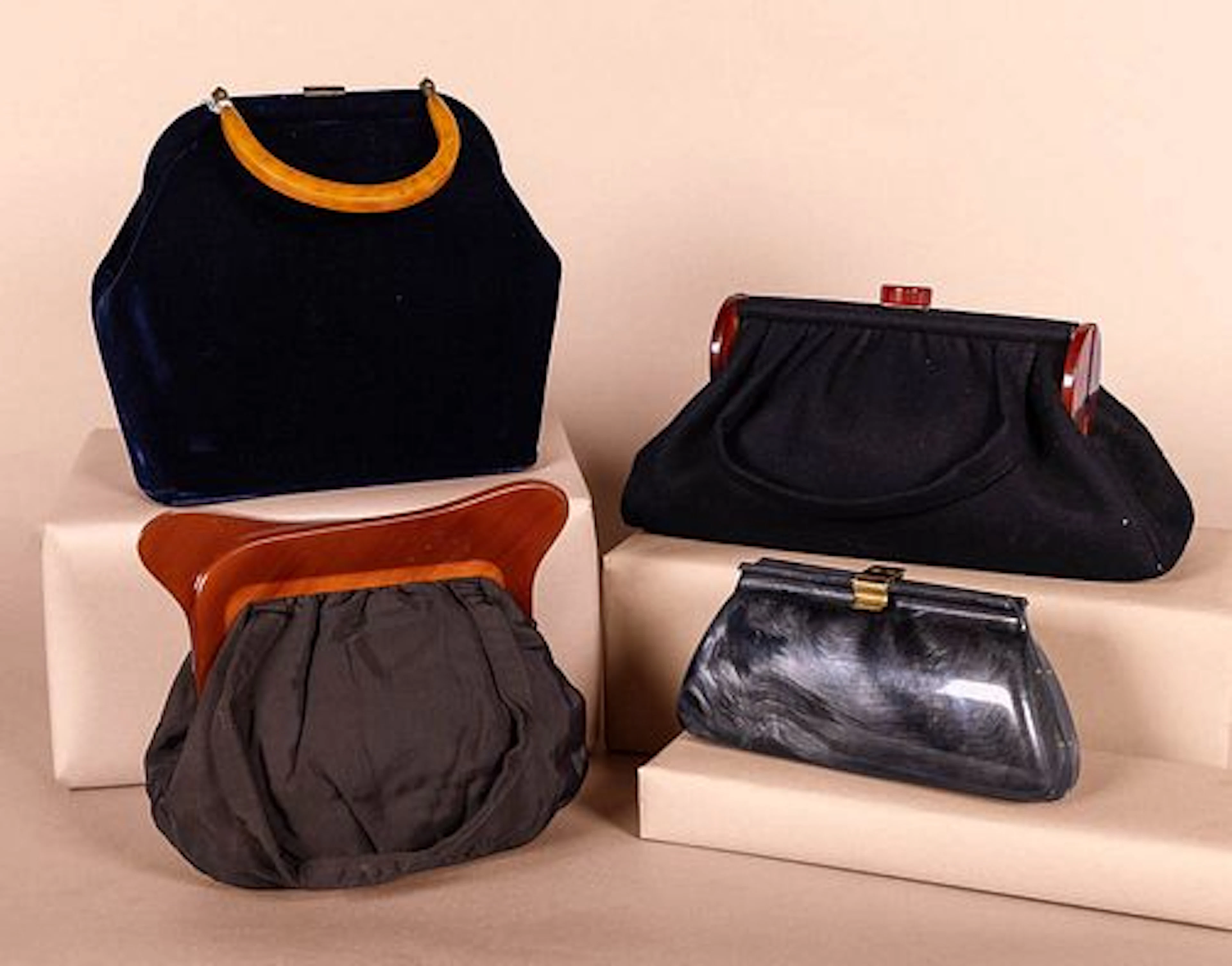 FOUR PURSES WITH BAKELITE ELEMENTS, 1950S
