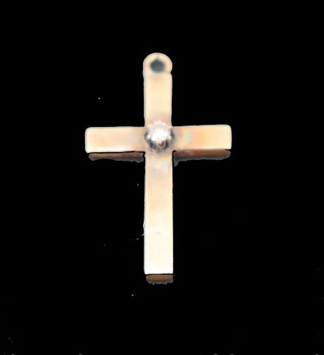 Tested 10k Gold and Diamond Cross Pendant - Gross 1 g.