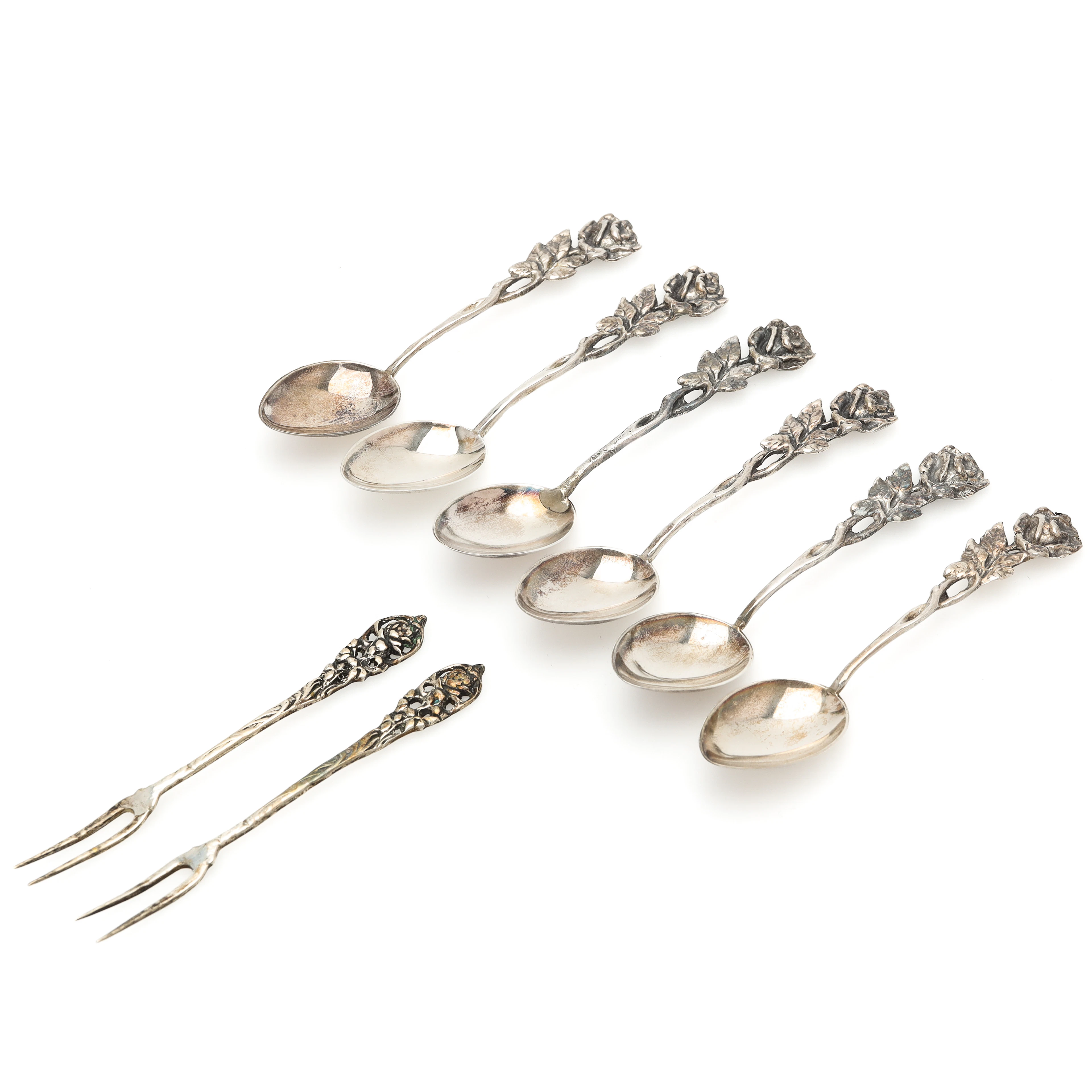 SKEDAR samt PLOCKGAFFLAR, 8 st, silver, rosen samt floral dekor, vikt 76 gram.