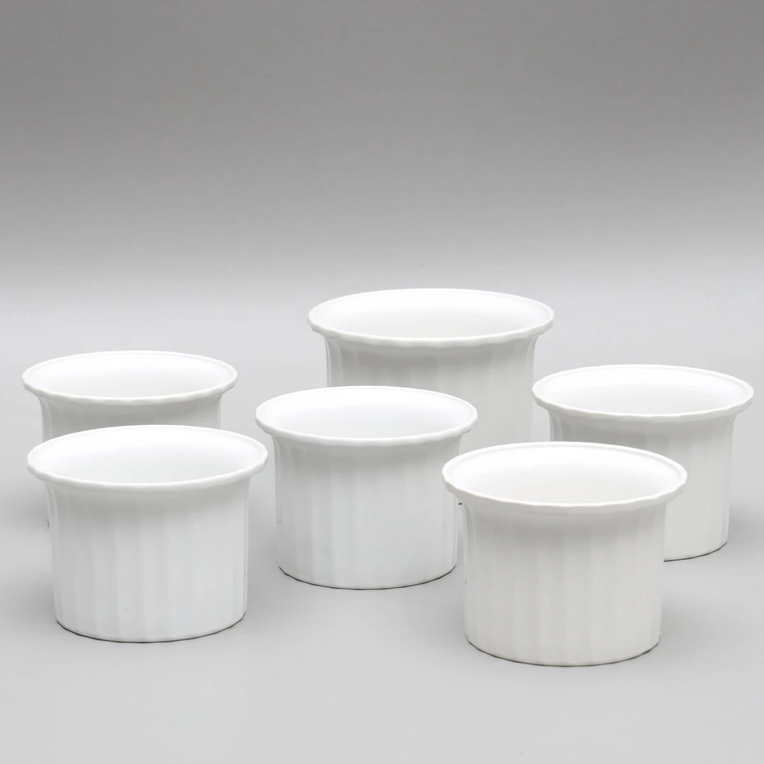 KARIN BJÖRQUIST. Ytterfoder, 6 delar, porslin, "Interflora", Gustavsberg.