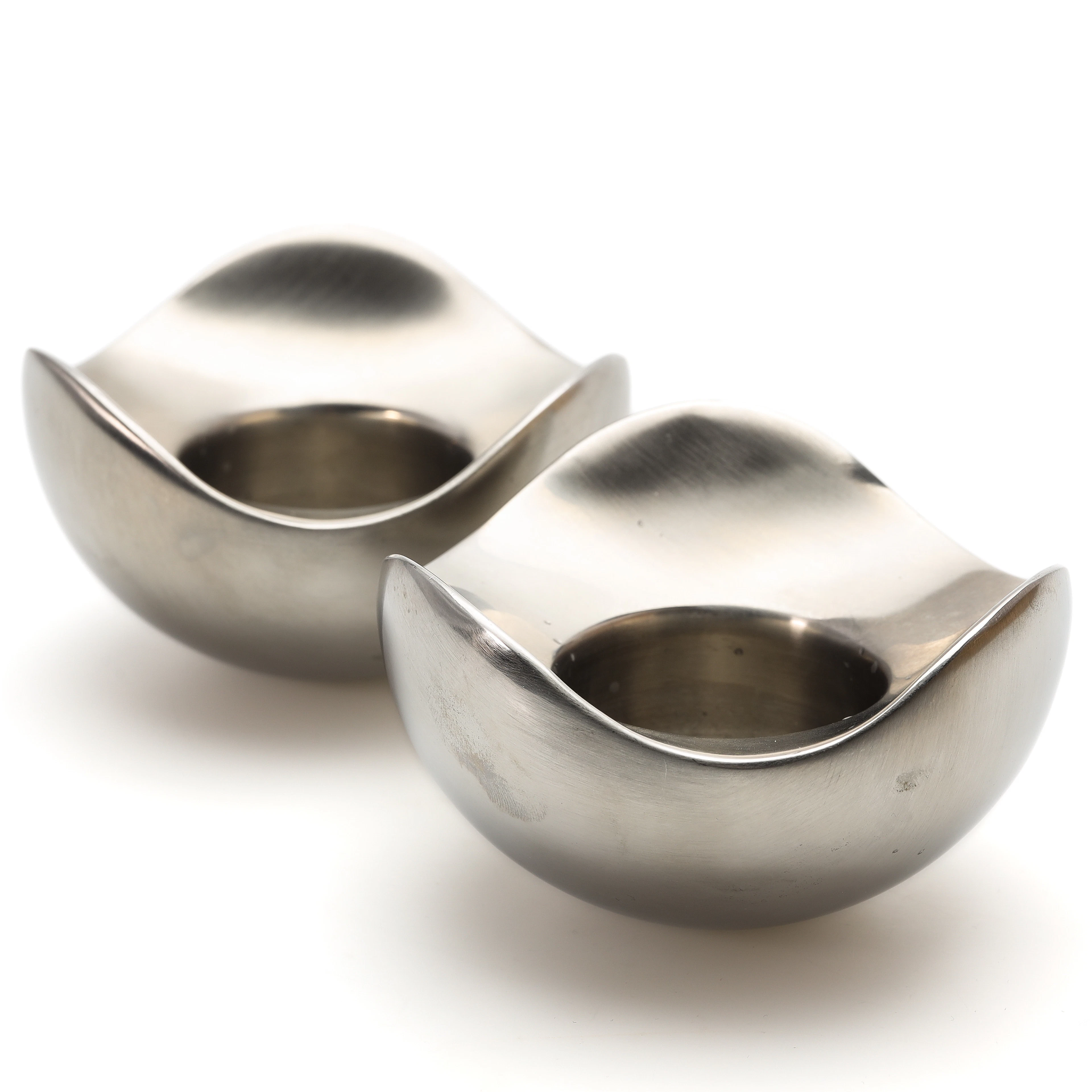 LJUSLYKTOR, ett par, bortsad stål, "Bloom", Georg Jensen, Danmark.