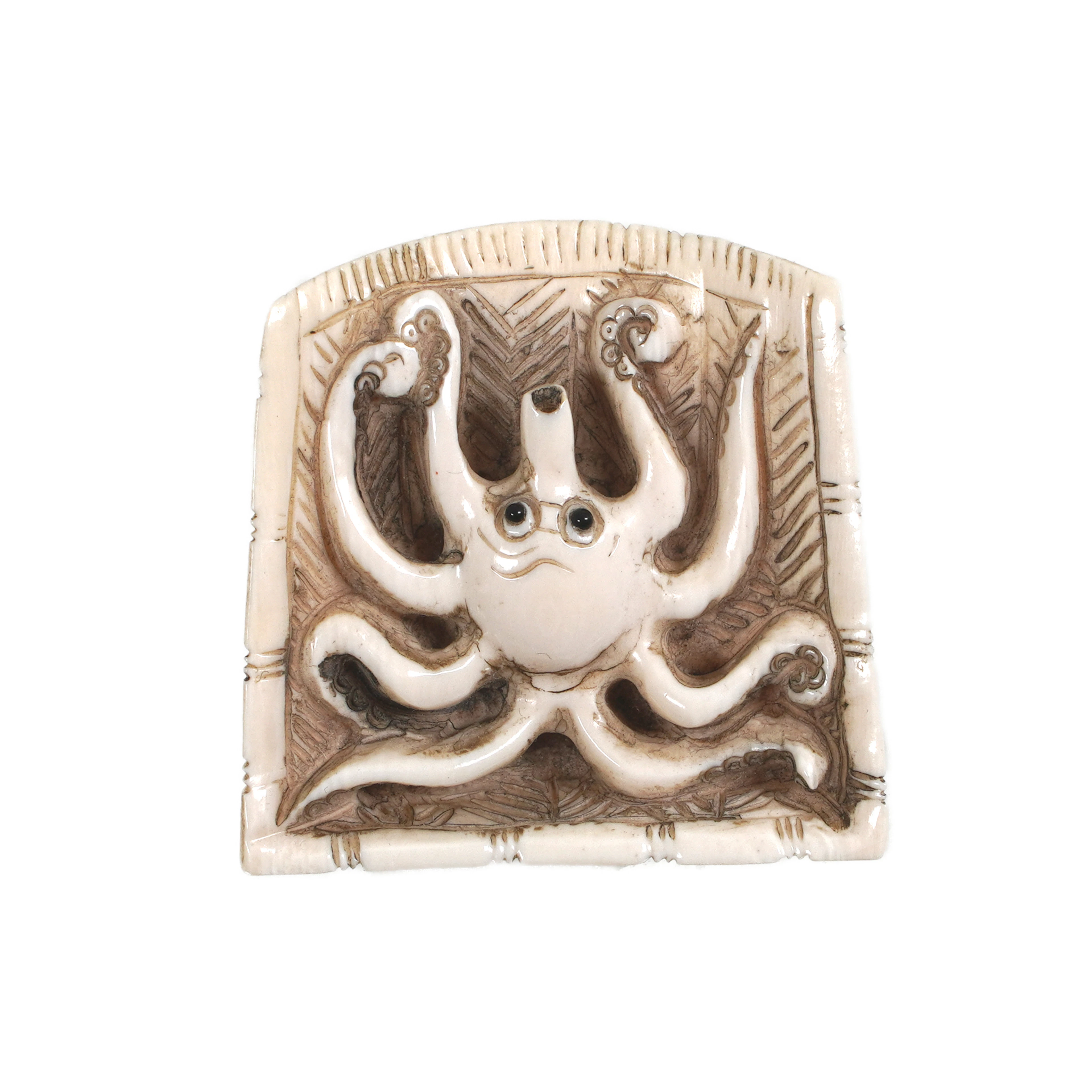 Netsuke, in einem Korb liegender Oktopus, Japan, ca. 1800-1900 (Ende