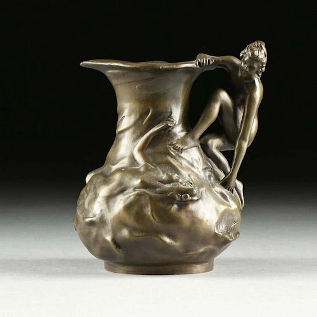 After Lucien Charles Edouard Alliot (French 1877-1967) A Bronze Figural Ewer