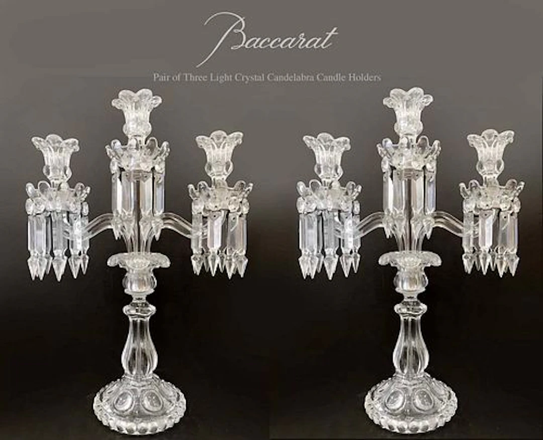 A Pair of French Baccarat Three light Crystal Candelabra, signed
