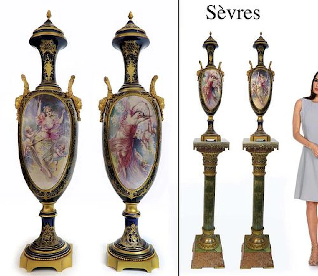 A PAIR OF SEVRES GILT BRONZE MOUNTED COVERED URNS