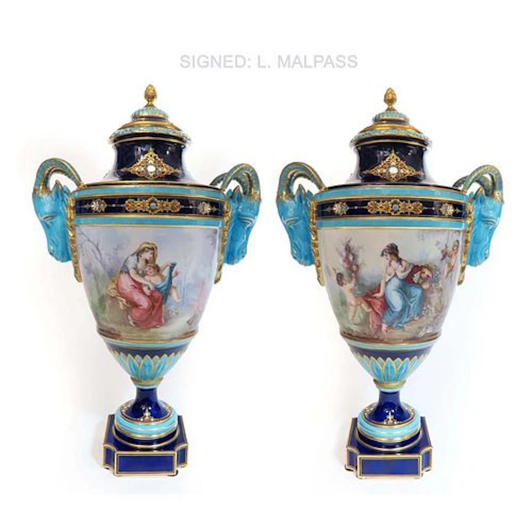 A PAIR OF SEVRES JEWELED PORCELAIN FIGURAL VASES