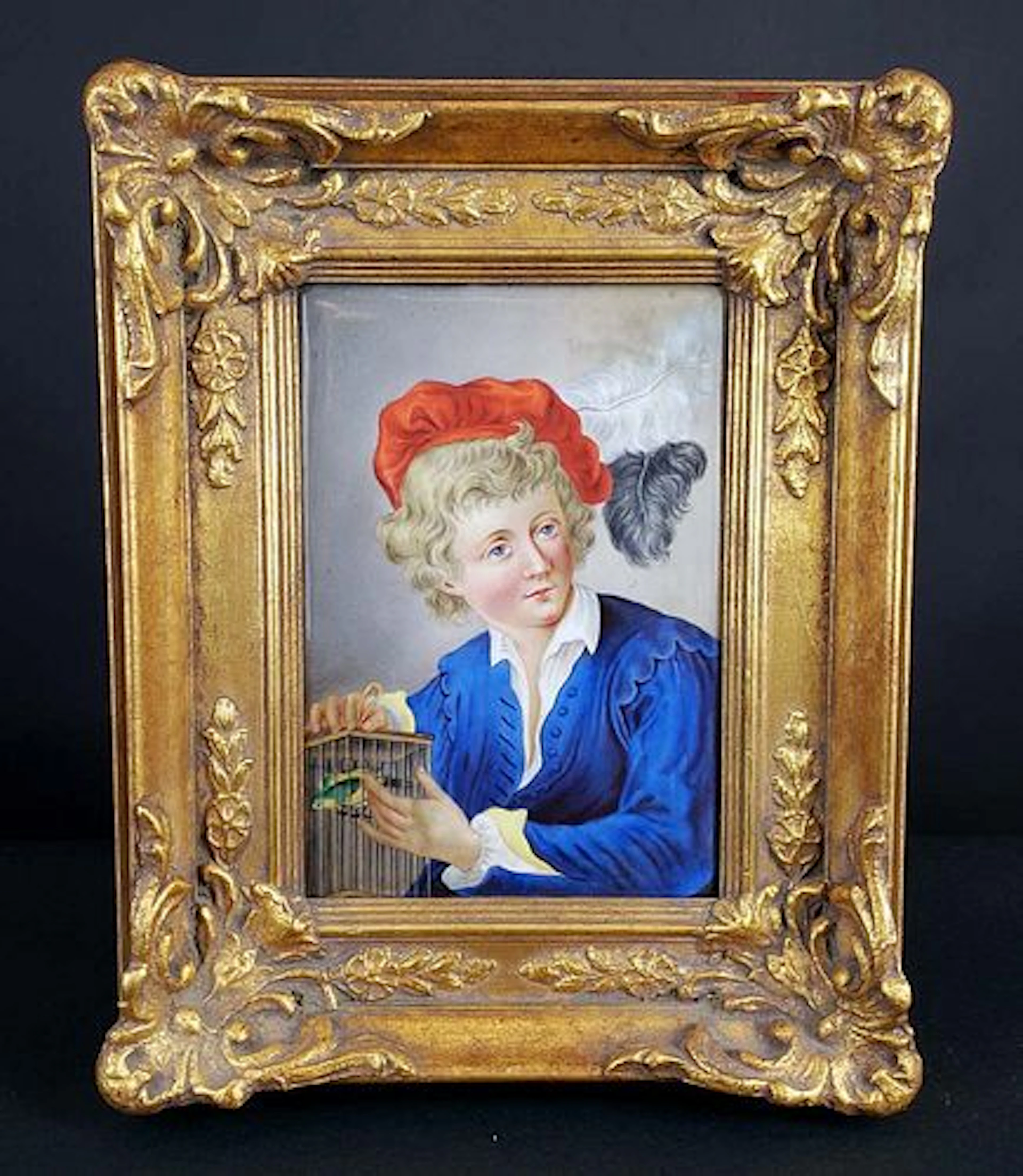 Dresden Plaque of Boy w/ Blue Jacket Holding Birdcage