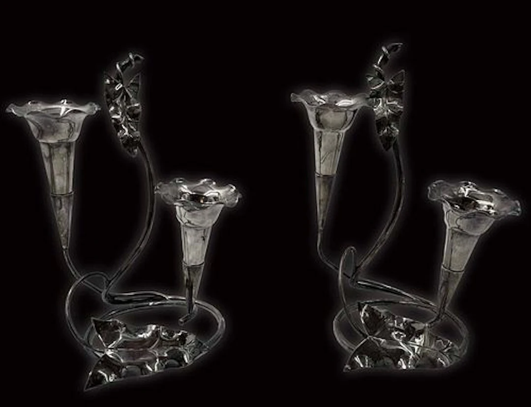 A Pair Of Silver-Plate Candelabras