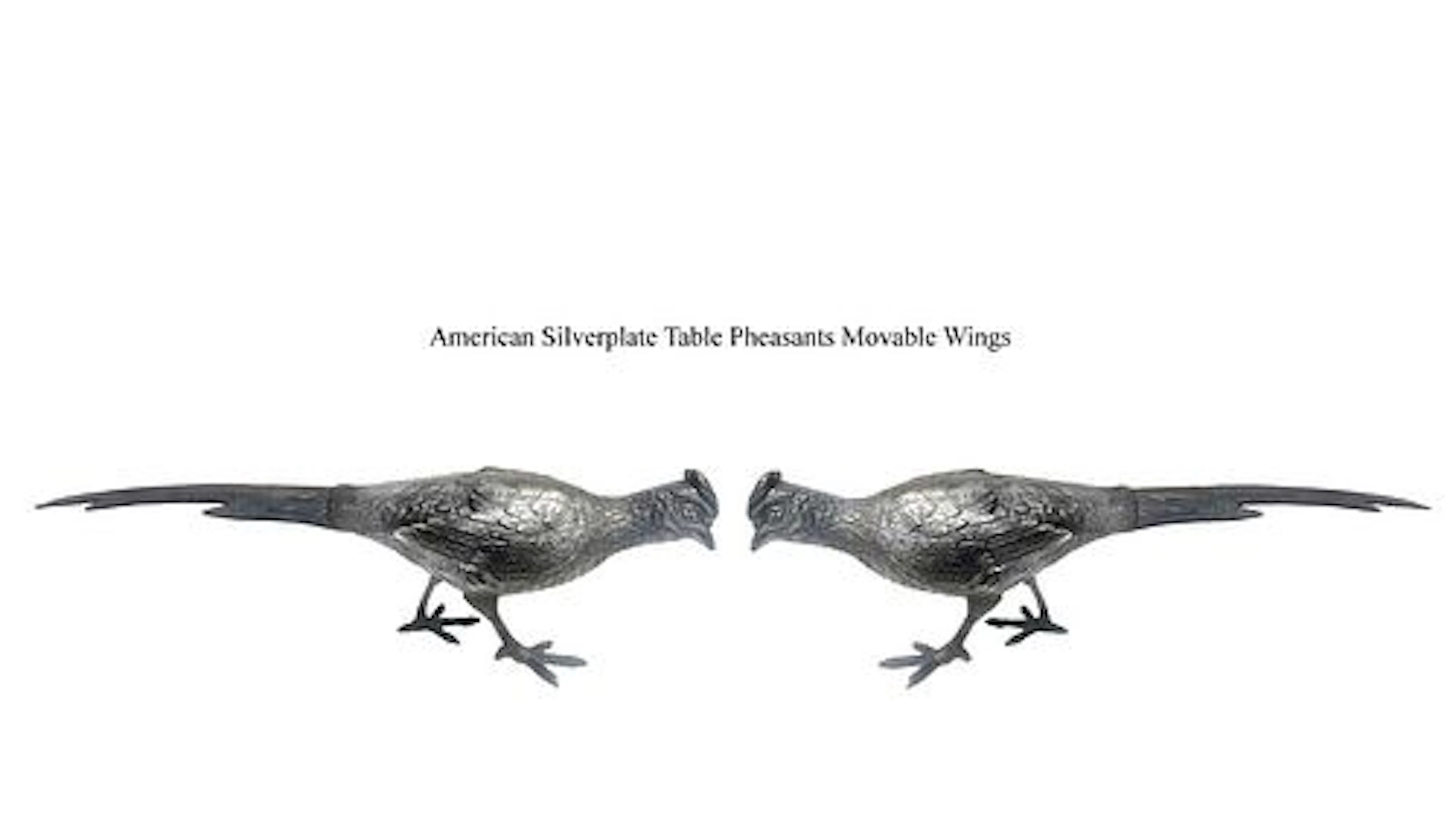A Pair Of American Wallace Silver-Plated Movable Wings Pheasant Figurines