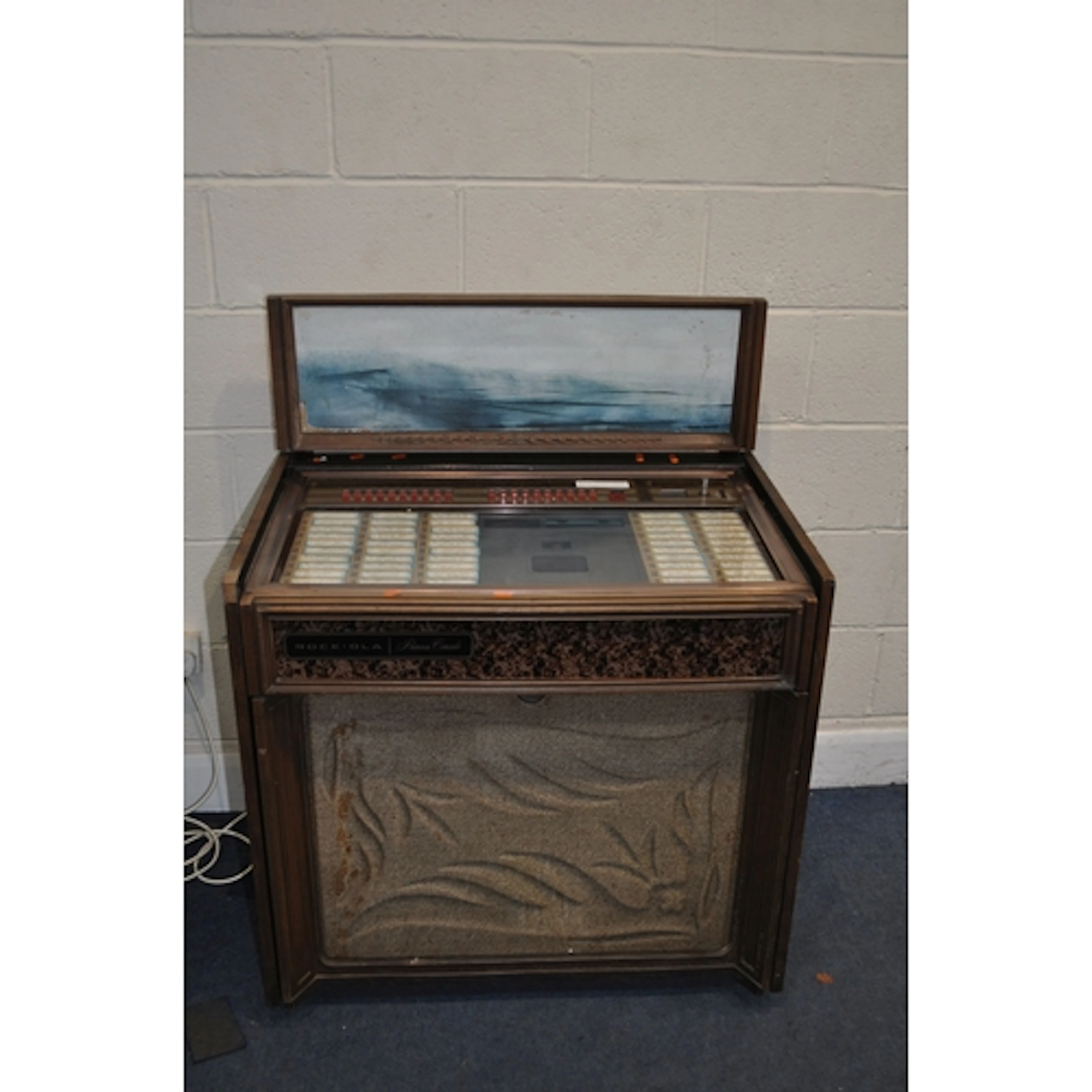A VINTAGE ROCK-OLA PRINCESS CONSOLE MODEL 461 JUKEBOX with o...