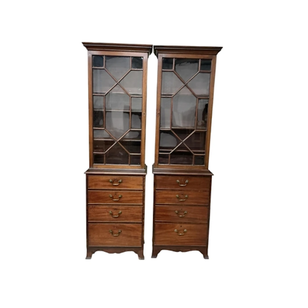 A pair of Georgian bookcases on chests, (adapted), width 62c...