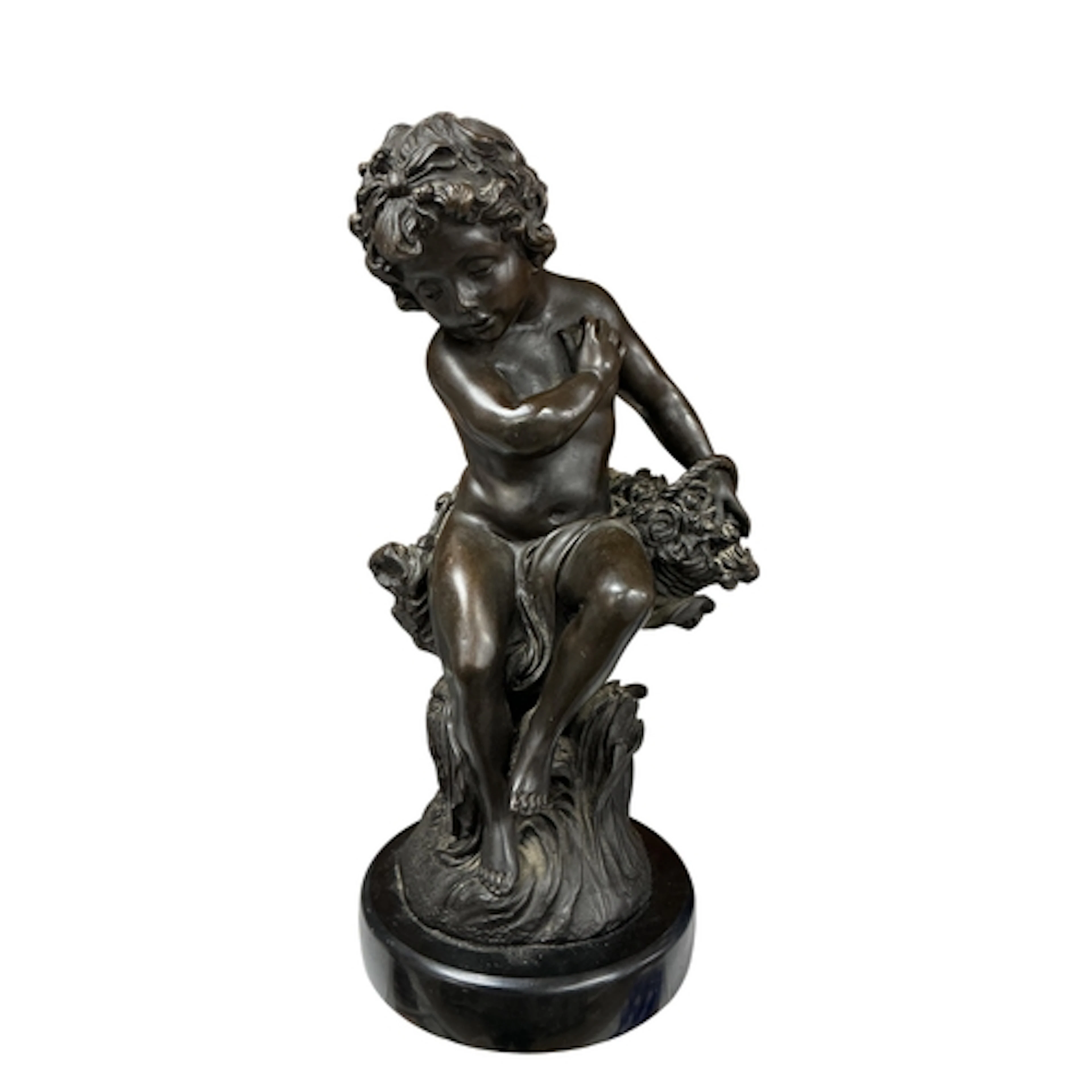 After Moreau. A patinated bronze figure of a seated youth w...