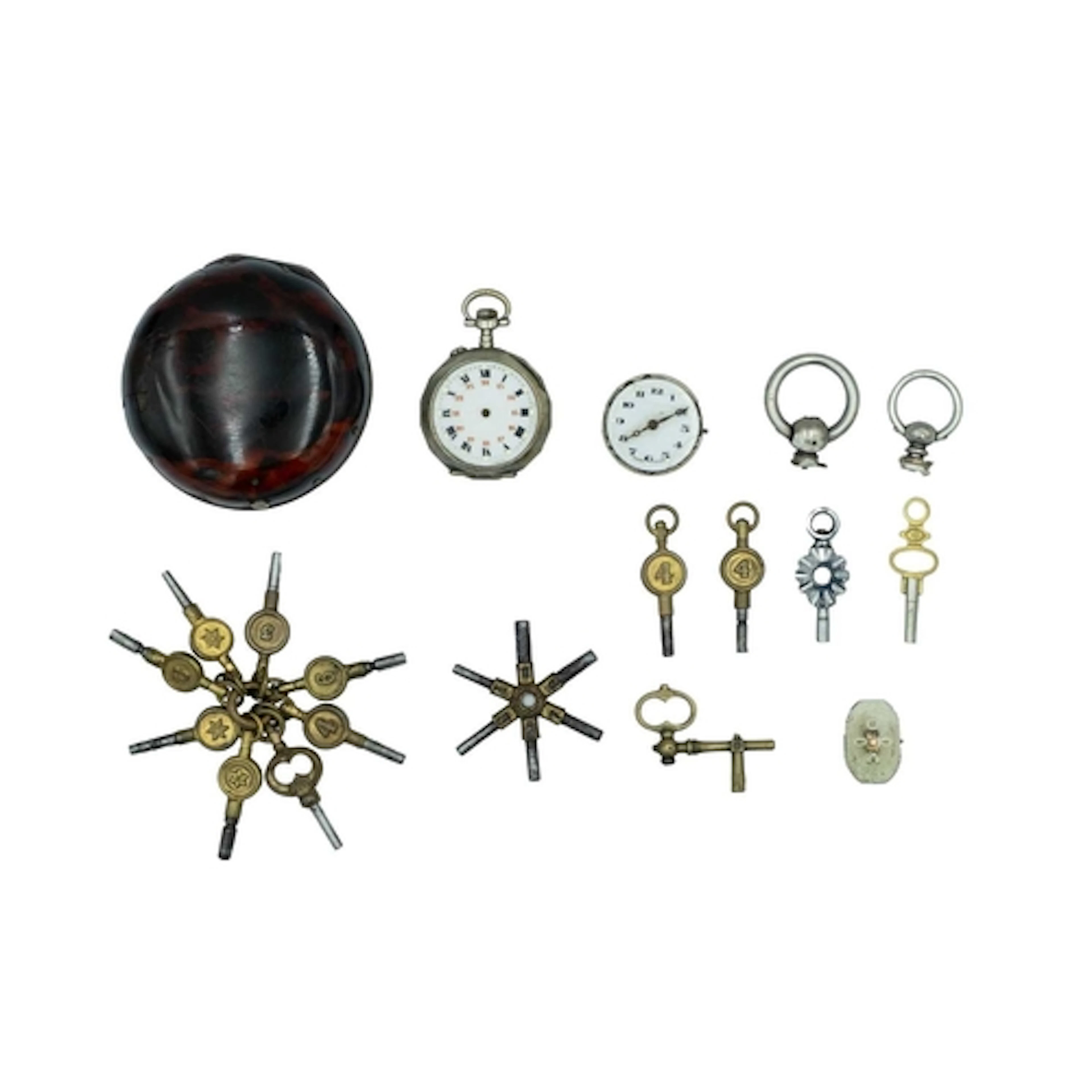 A collection of pocket watch spares and accessories. To incl...