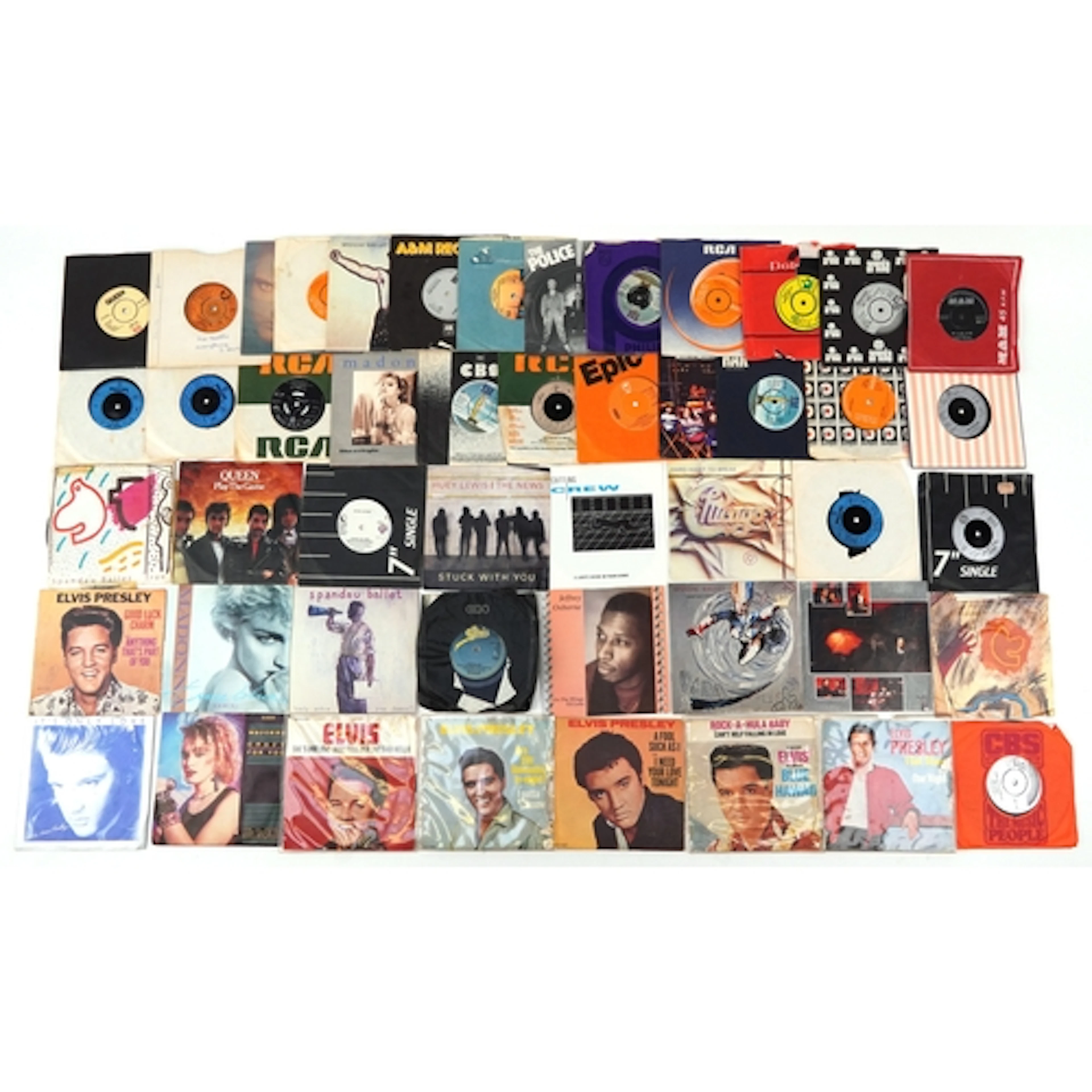 Collection of 45rpm records including Elvis Presley, Madonna...