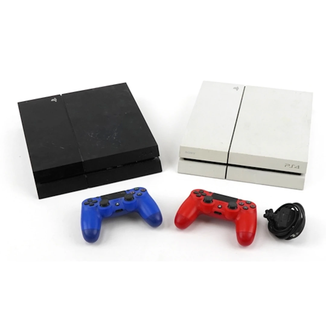 Two Sony PlayStation PS4 games consoles with two controllers...