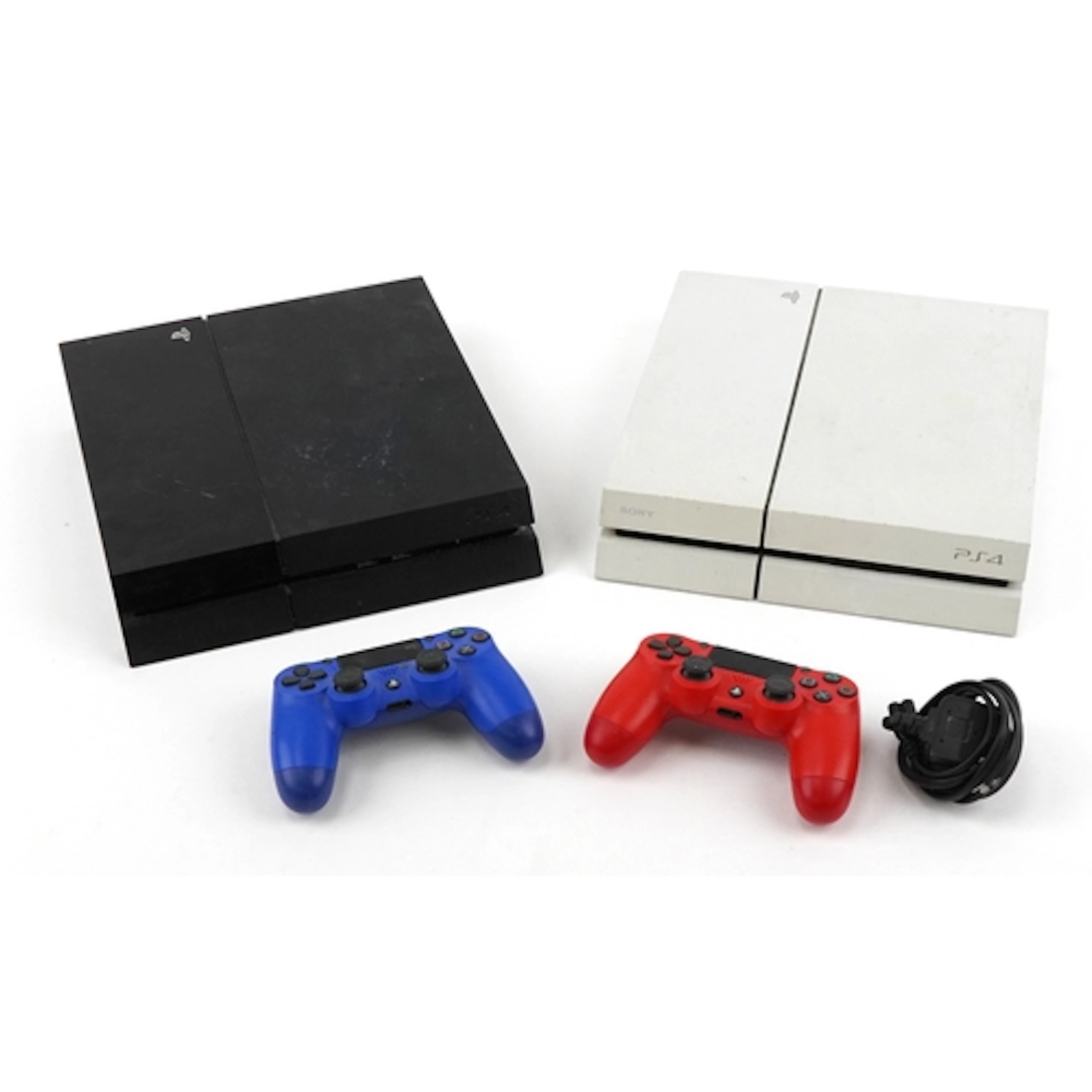Two Sony PlayStation PS4 games consoles with two controllers...