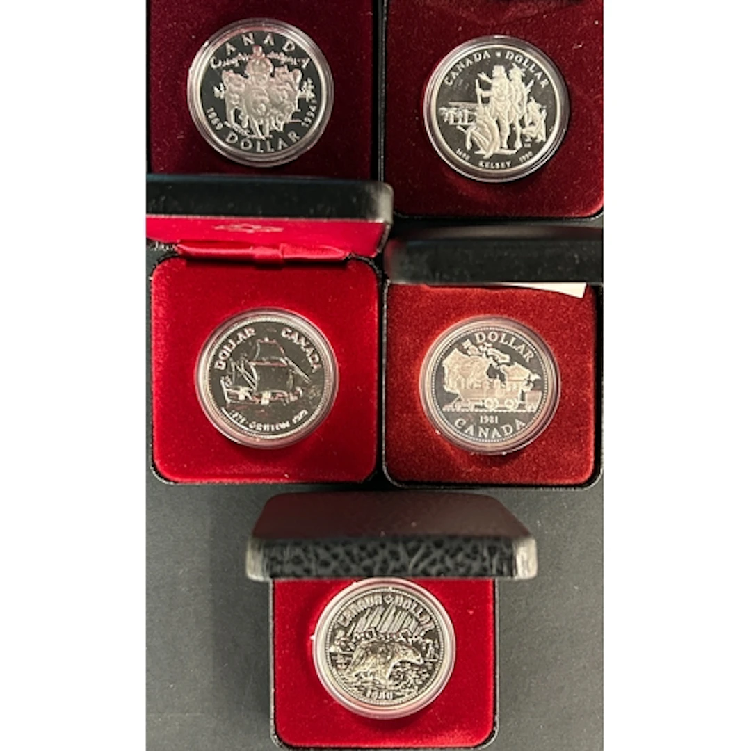 A group of nine Canadian silver $1 coins dated 1973 to 1994,...