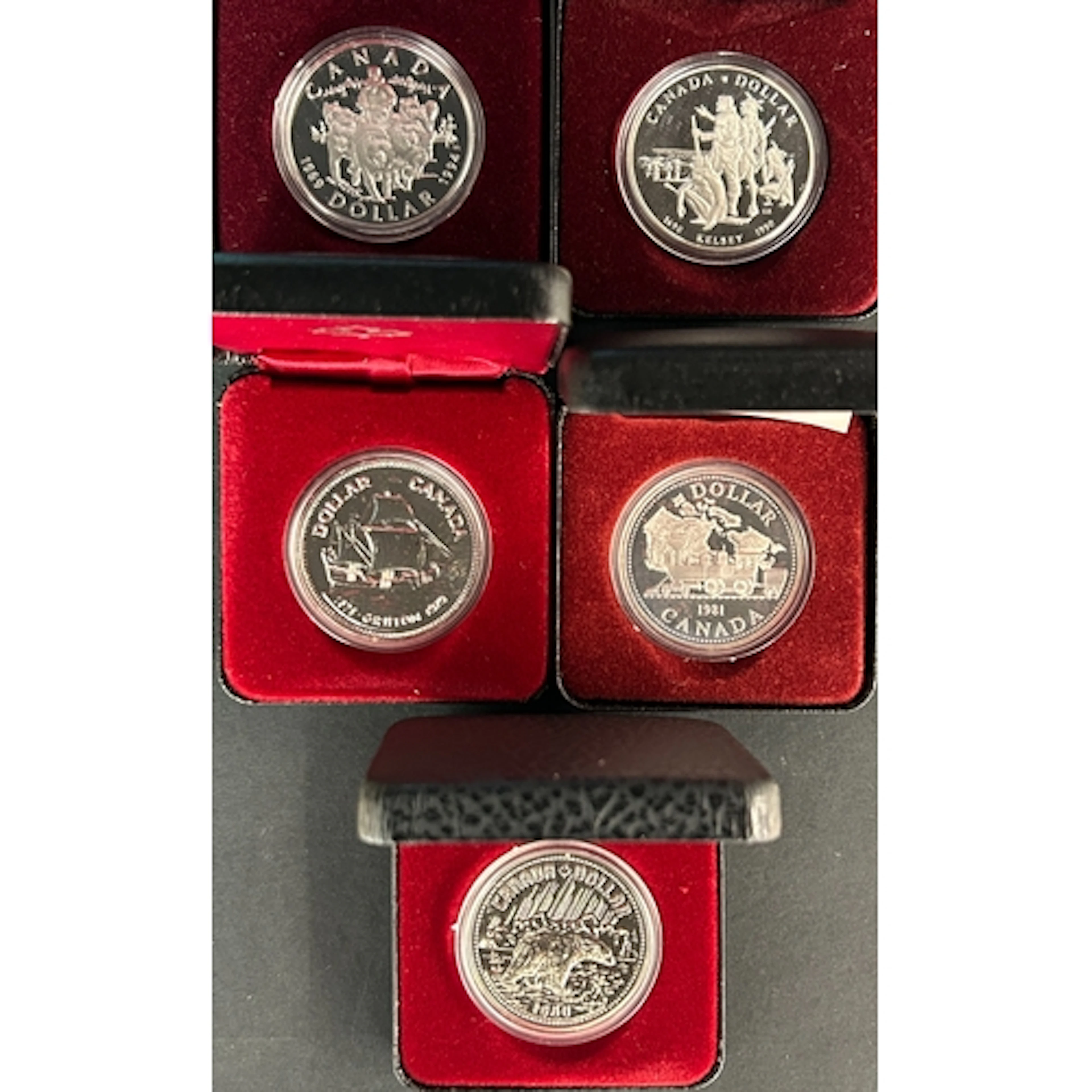 A group of nine Canadian silver $1 coins dated 1973 to 1994,...