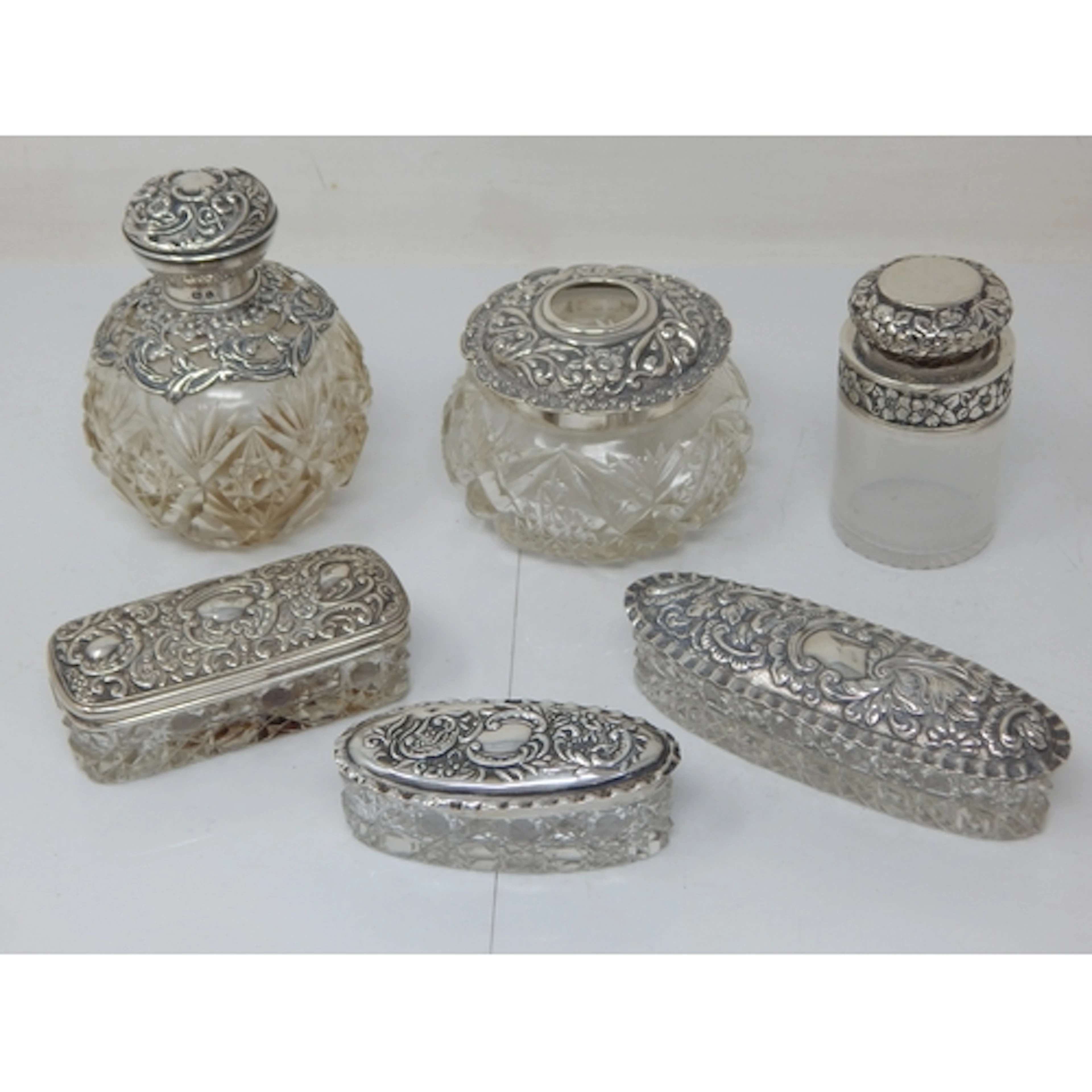A Quantity of Hallmarked Silver Lidded Dressing Table Jars: ...