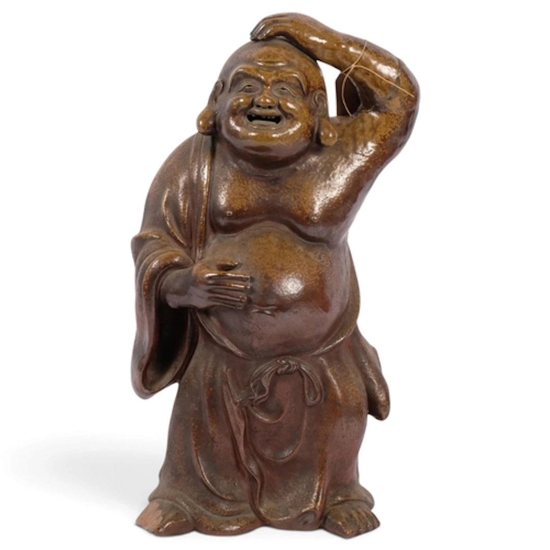A Chinese ceramic Budai figure, with painted bronze patina, ...