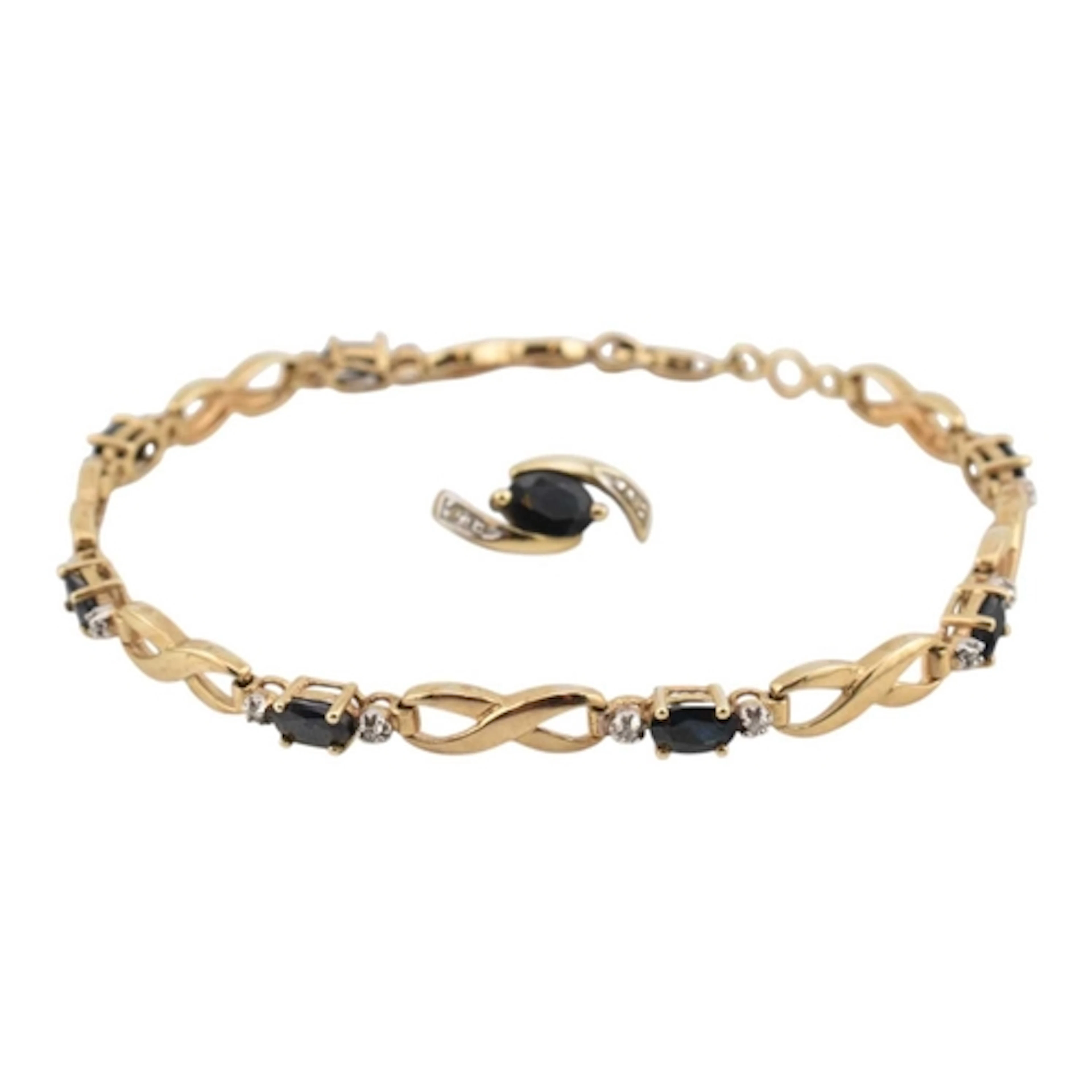 A 9ct gold sapphire and diamond set bracelet and matched CZ ...