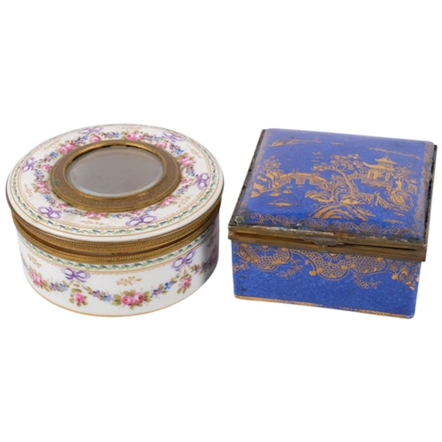 A circular Sevres box, with hinged cover and glass panel to ...