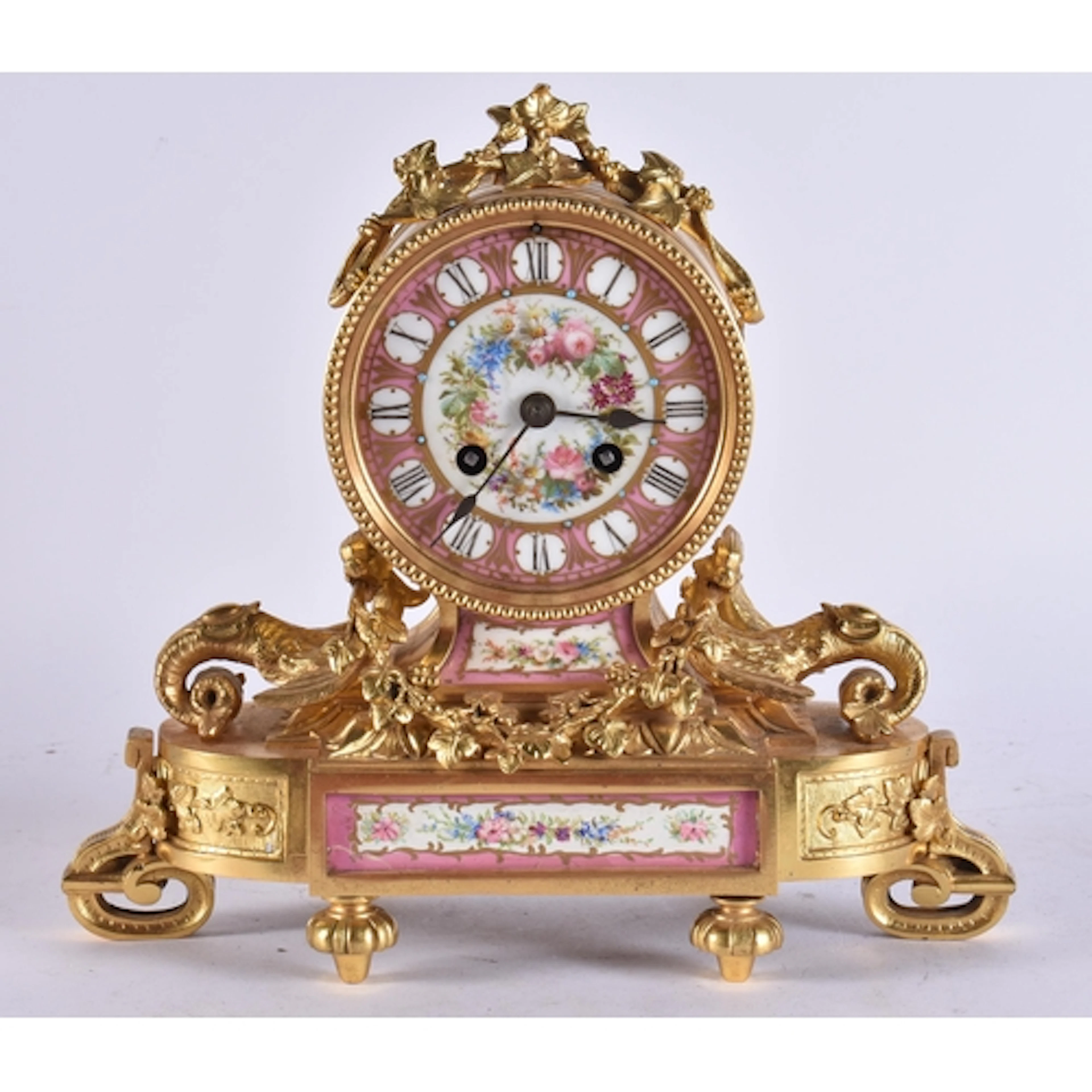 A 19TH CENTURY FRENCH ORMOLU DRUM CASED EIGHT DAY MANTEL CLO...
