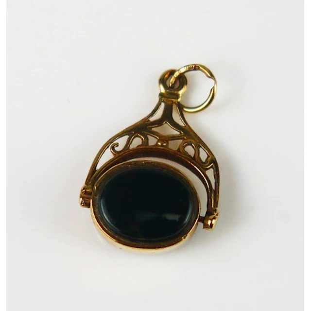 A 9ct gold and onyx swivel fob, hallmarked, 2.46g