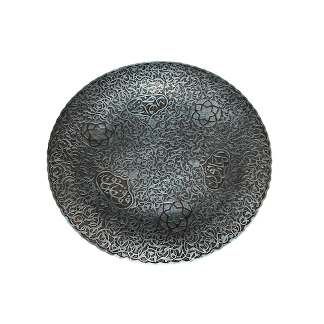 An Islamic or Persian silver overlaid copper dish, diameter ...