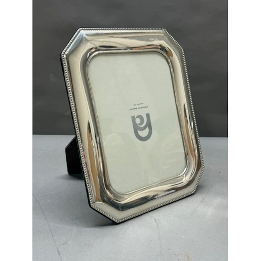 An Italian silver photograph frame. 26x32cm