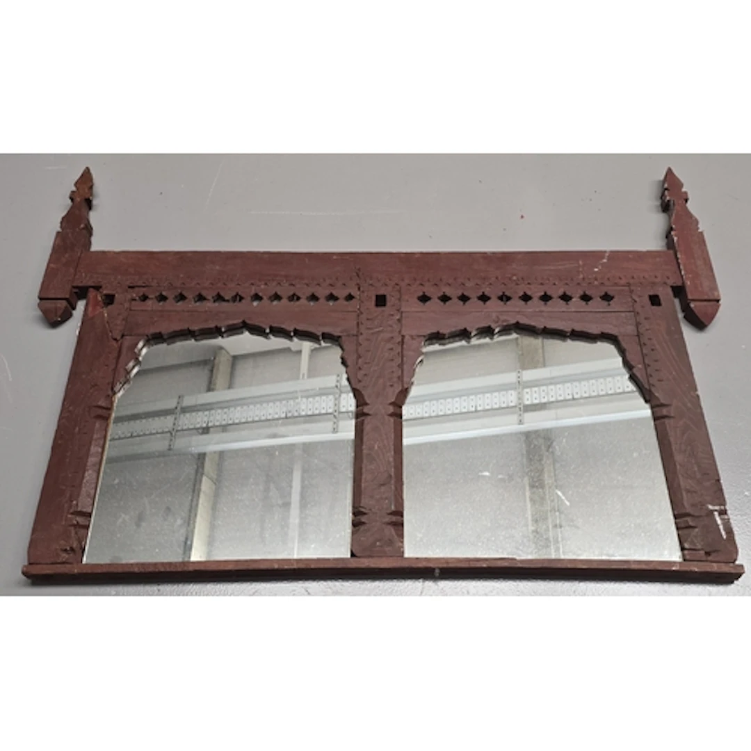 A vintage rustic hand carved Indian wooden mirror featuring ...
