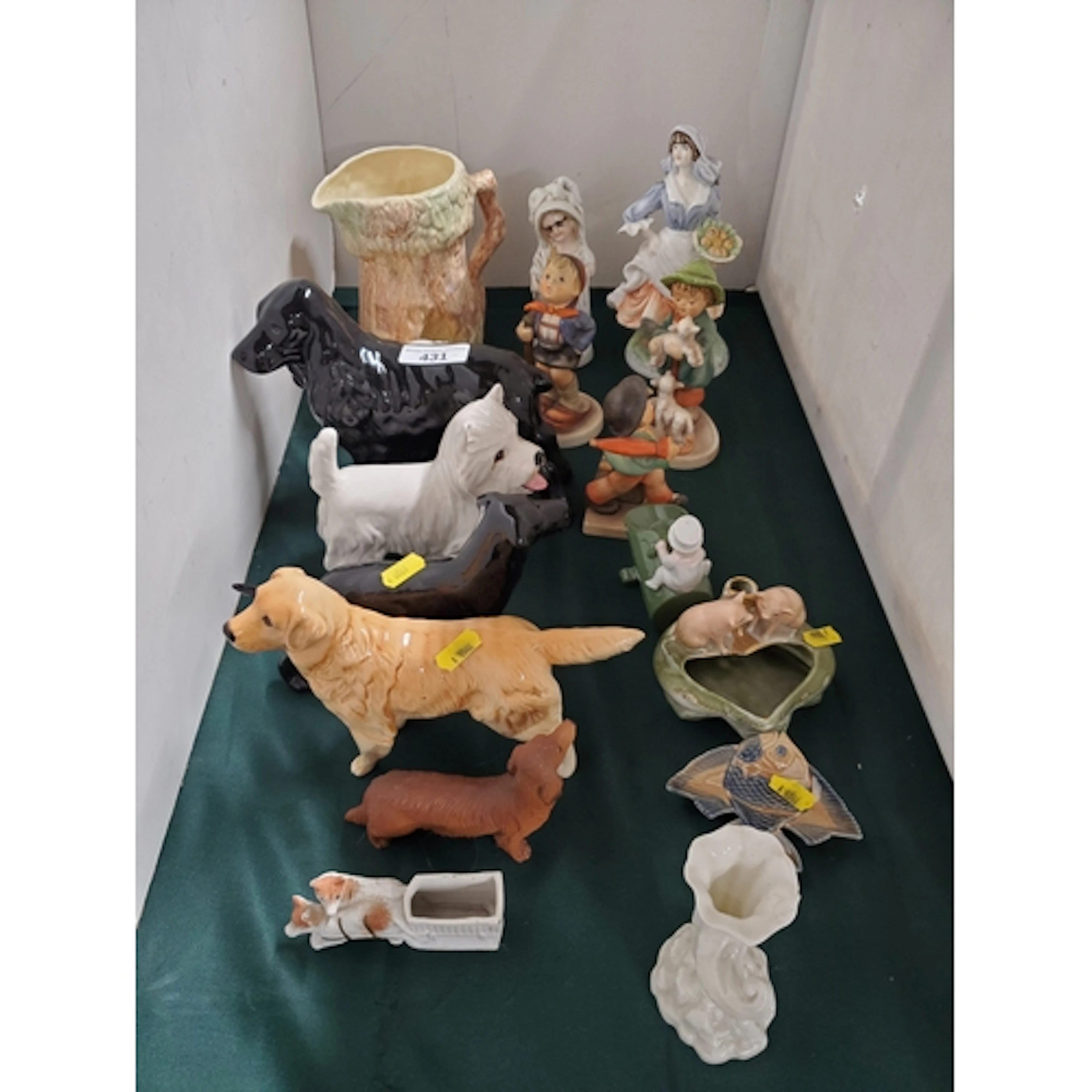 A selection of ceramic Figures including a Beswick Golden Re...