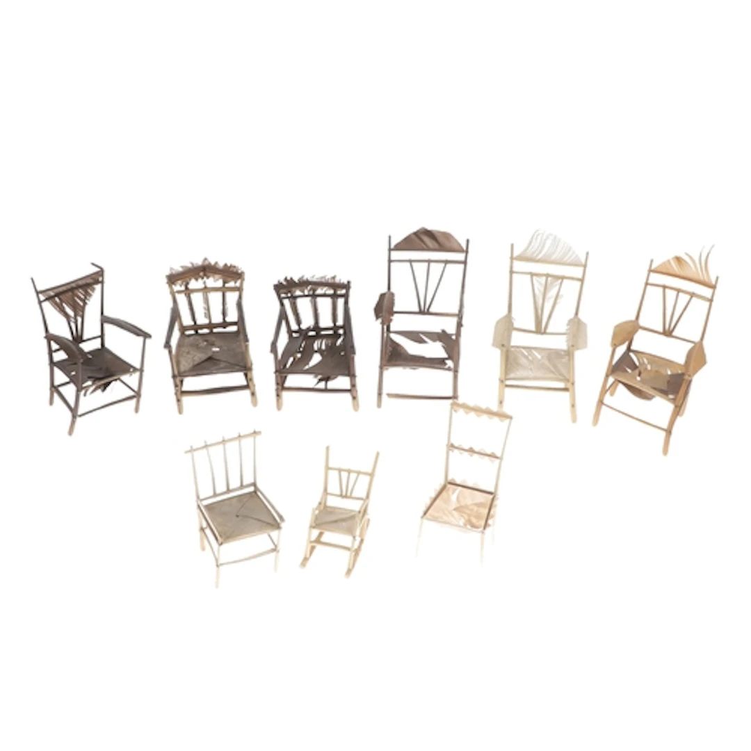 ANTIQUE 'FEATHER' DOLLS HOUSE FURNITURE. A collection of nin...