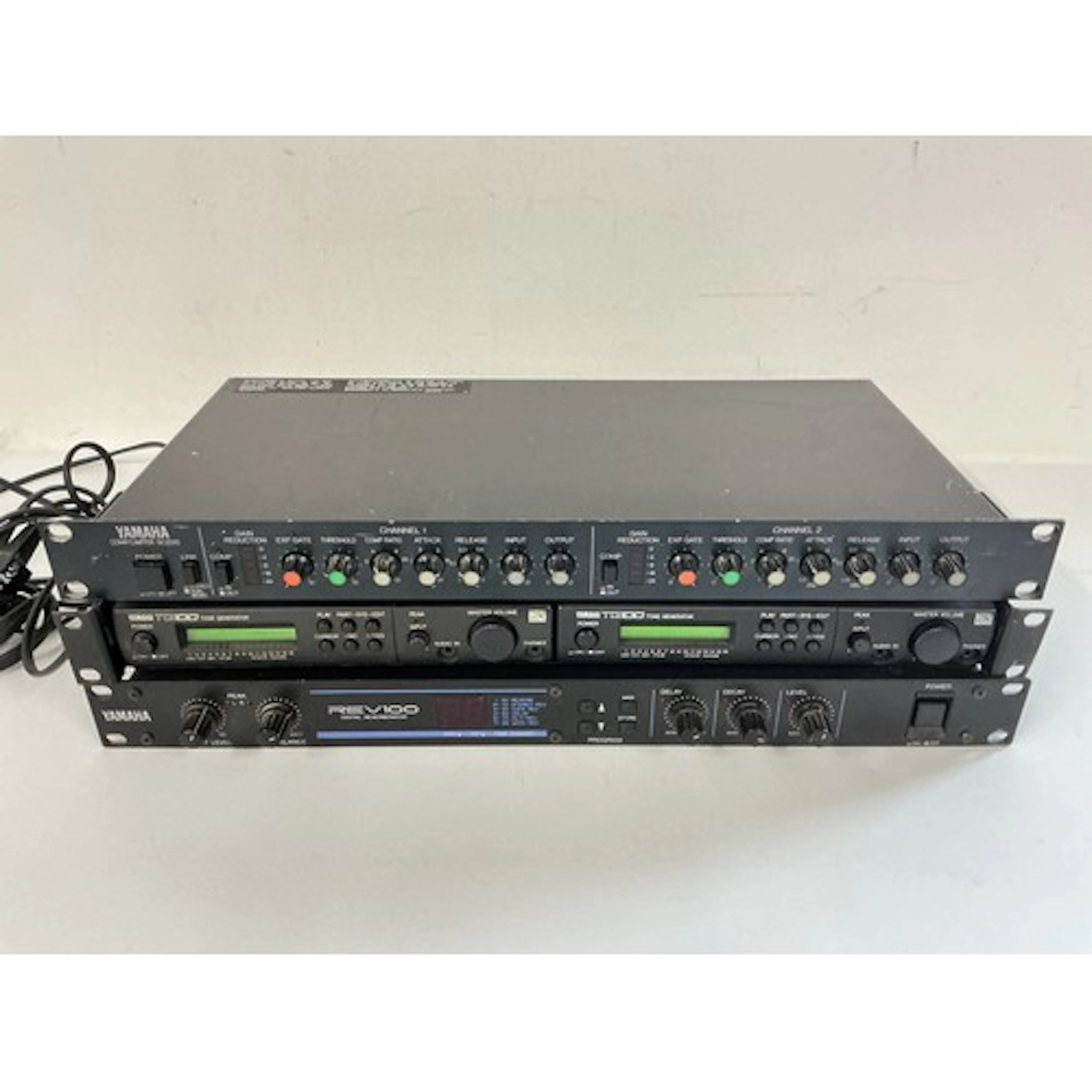Four rack effects units comprising two Yamaha TG100 tone gen...