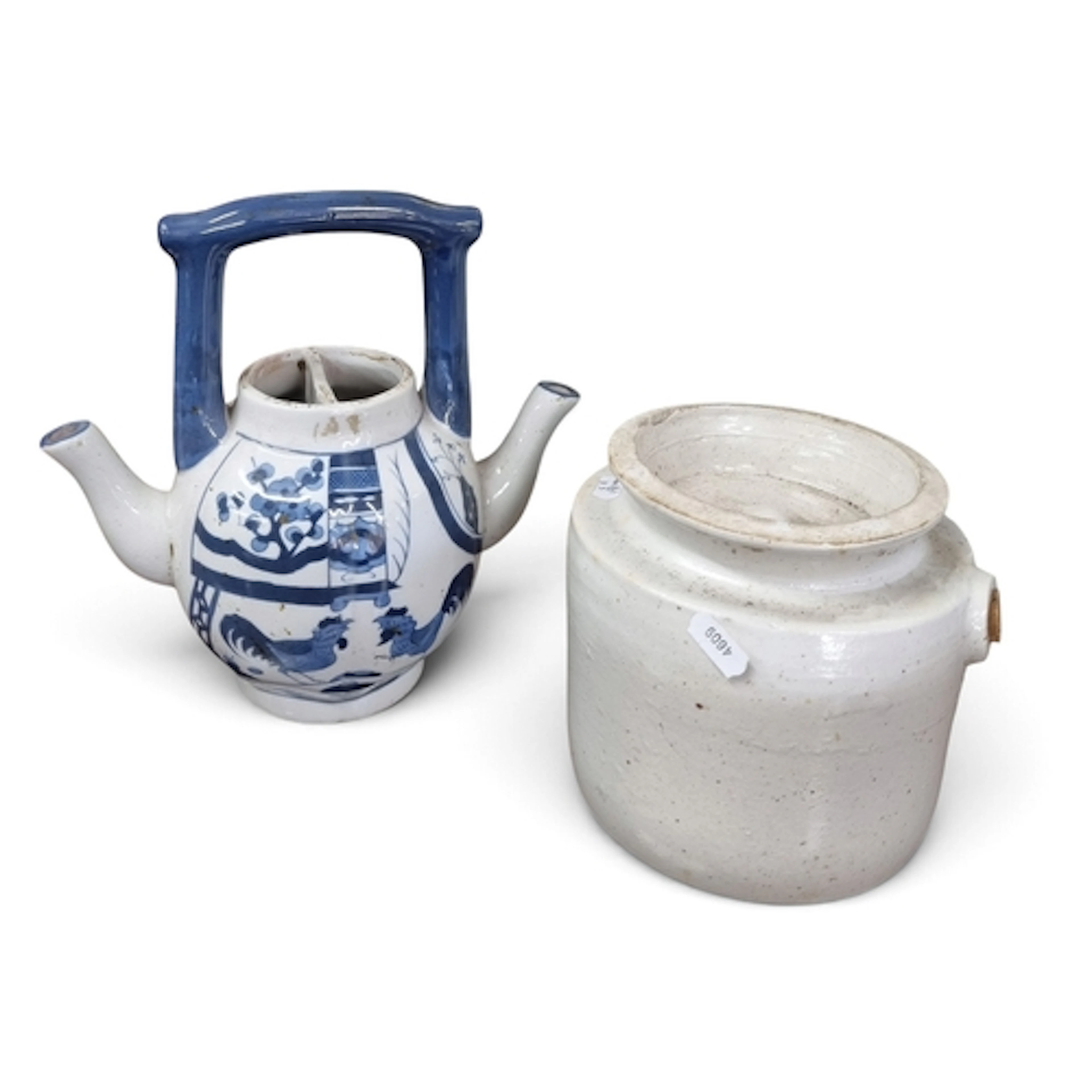 An early 20th Century Stoneware Drip Waterer in original con...