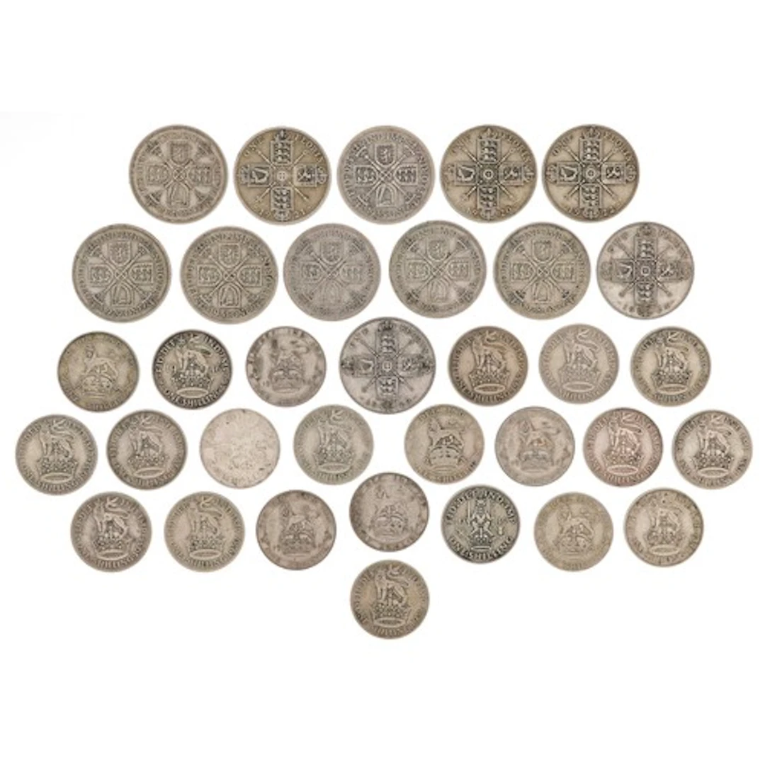 British pre 1947 silver coins comprising sixpences, shilling...