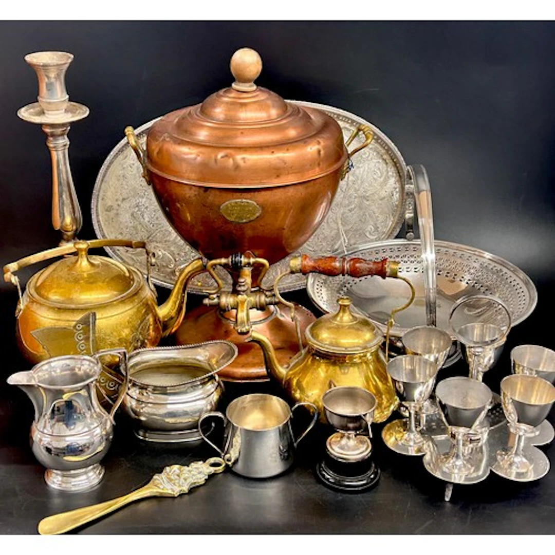 A collection of metalware to include a copper samovar, a cop...